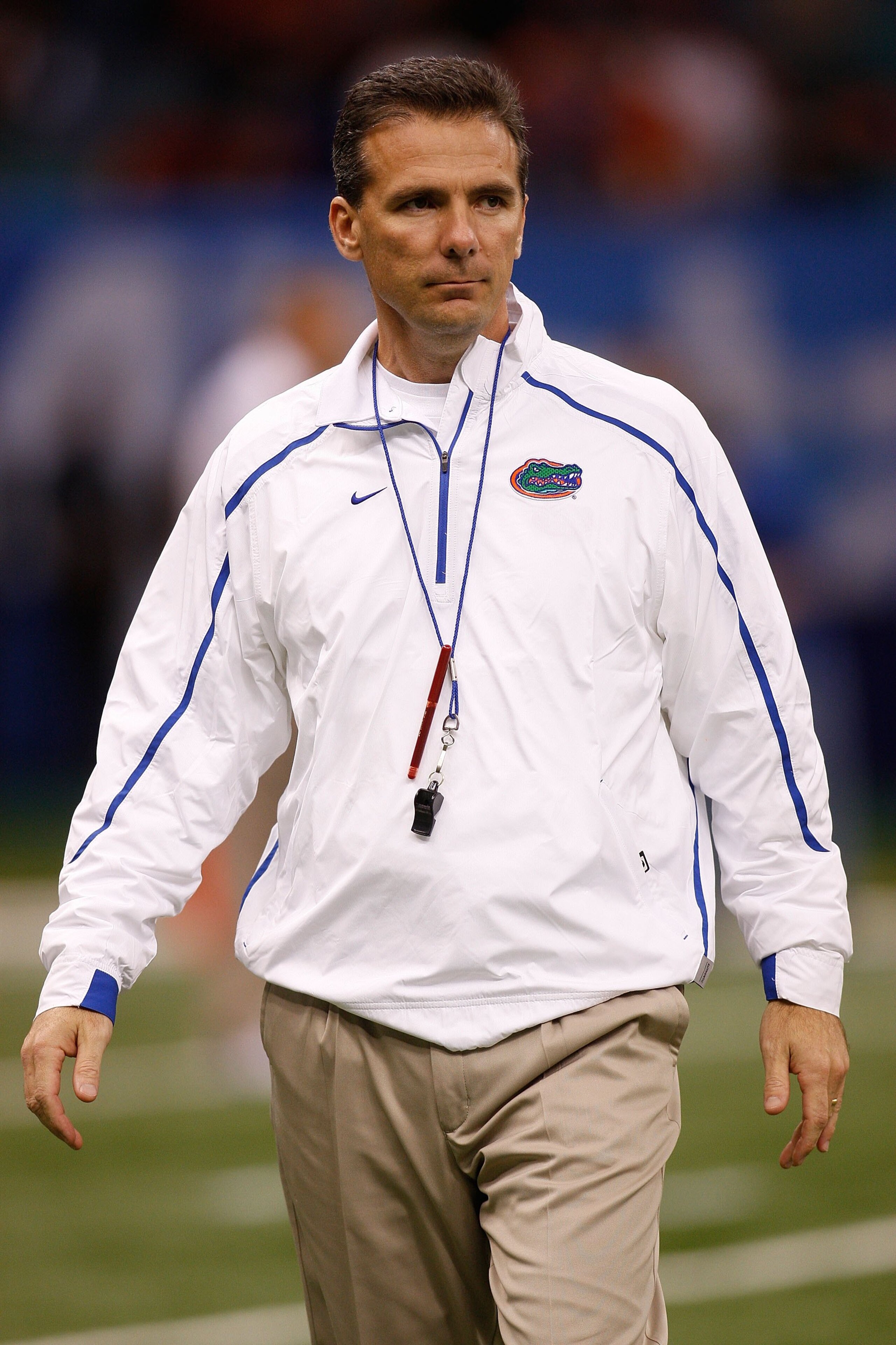 NEW ORLEANS - JANUARY 01: Head coach Urban Meyer of the Florida Gators watches his team warm up before playing the Cincinnati Bearcats during the Allstate Sugar Bowl at the Louisana Superdome on January 1, 2010 in New Orleans, Louisiana. (Photo by Chris NEW ORLEANS - JANUARY 01: Head coach Urban Meyer of the Florida Gators watches his team warm up before playing the Cincinnati Bearcats during the Allstate Sugar Bowl at the Louisana Superdome on January 1, 2010 in New Orleans, Louisiana. (Photo by Chris