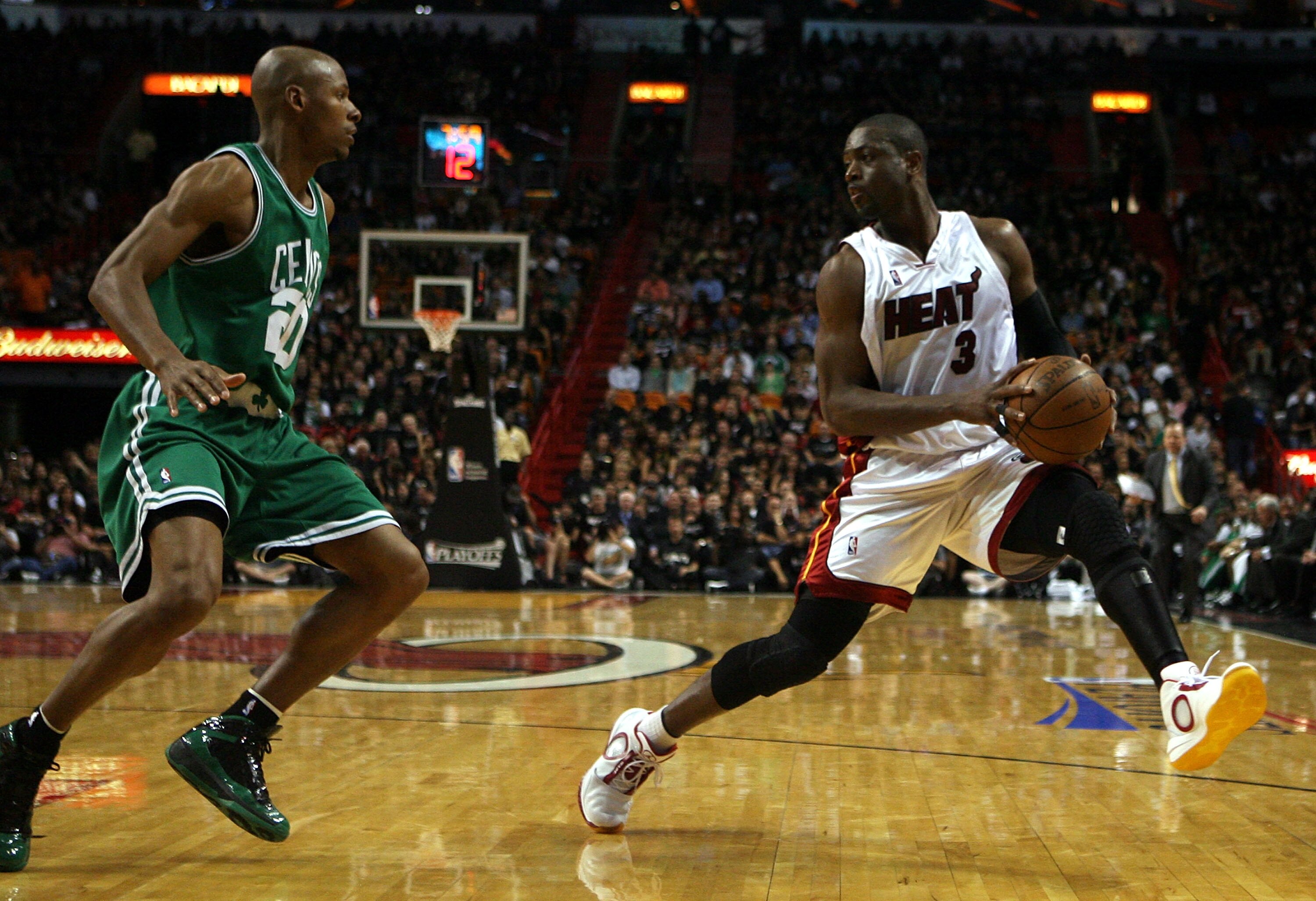 MIAMI - APRIL 23:  Guard Ray Allen #20 of the Boston Celtics defends guard Dwyane Wade #3 of the Miami Heat in Game Three of the Eastern Conference Quarterfinals during the 2010 NBA Playoffs at American Airlines Arena on April 23, 2010 in Miami, Florida.