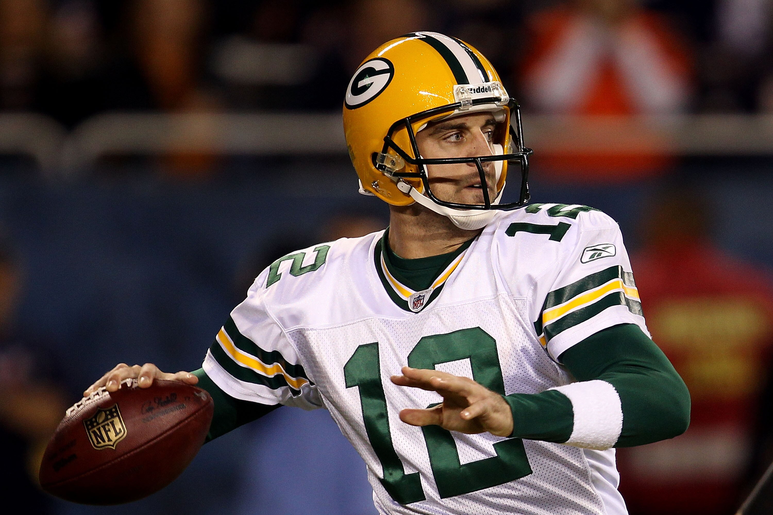 CHICAGO - SEPTEMBER 27:  Aaron Rodgers #12 of the Green Bay Packers looks to pass against the Chicago Bears at Soldier Field on September 27, 2010 in Chicago, Illinois.  (Photo by Jonathan Daniel/Getty Images)