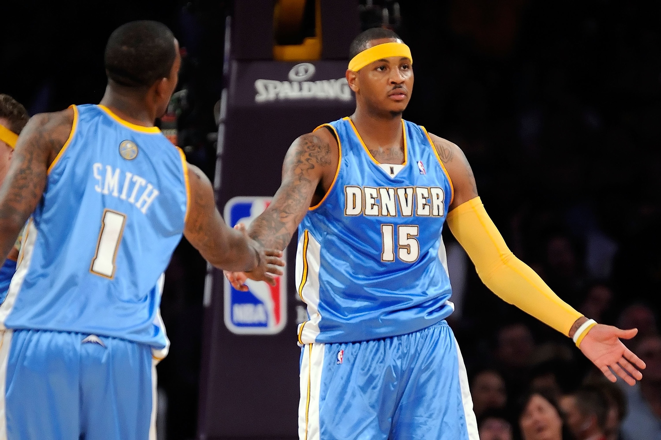 LOS ANGELES, CA - MAY 27:  Carmelo Anthony #15 gives a five to teammate J.R. Smith #1 of the Denver Nuggets against the Los Angeles Lakers in Game Five of the Western Conference Finals during the 2009 NBA Playoffs at Staples Center on May 27, 2009 in Los