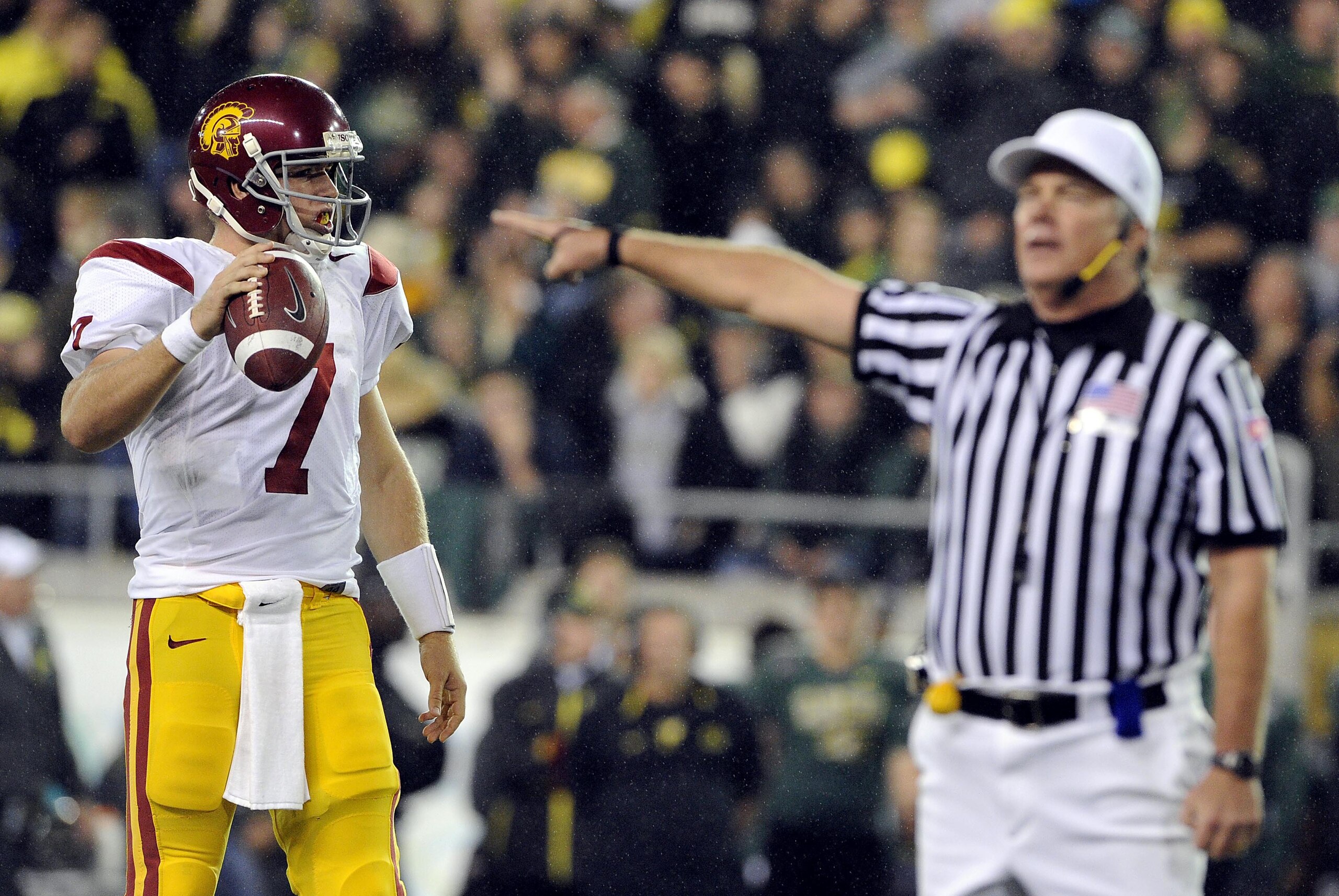 EUGENE, OR - OCTOBER 31: Quarterback Matt Barkley #7 of the USC Trojans is not happy after as an official calla a false start on the Trojans in the second quarter of the game against the Oregon Ducks at Autzen Stadium on October 31, 2009 in Eugene, Oregon