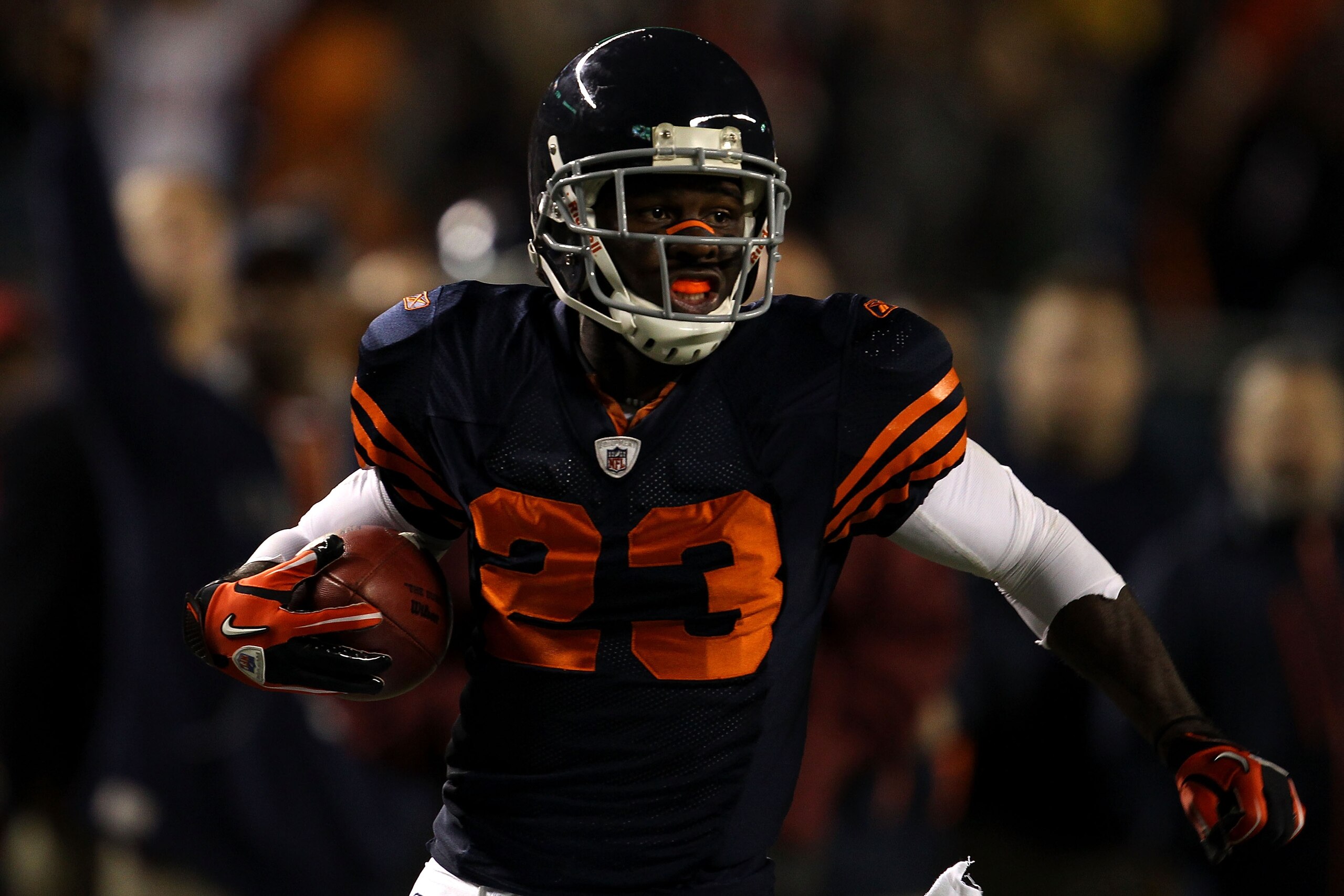 CHICAGO - SEPTEMBER 27:  Devin Hester #23 of the Chicago Bears returns a punt 62-yards for a touchdown in the fourth quarter against the Green Bay Packers at Soldier Field on September 27, 2010 in Chicago, Illinois.  (Photo by Jonathan Daniel/Getty Images