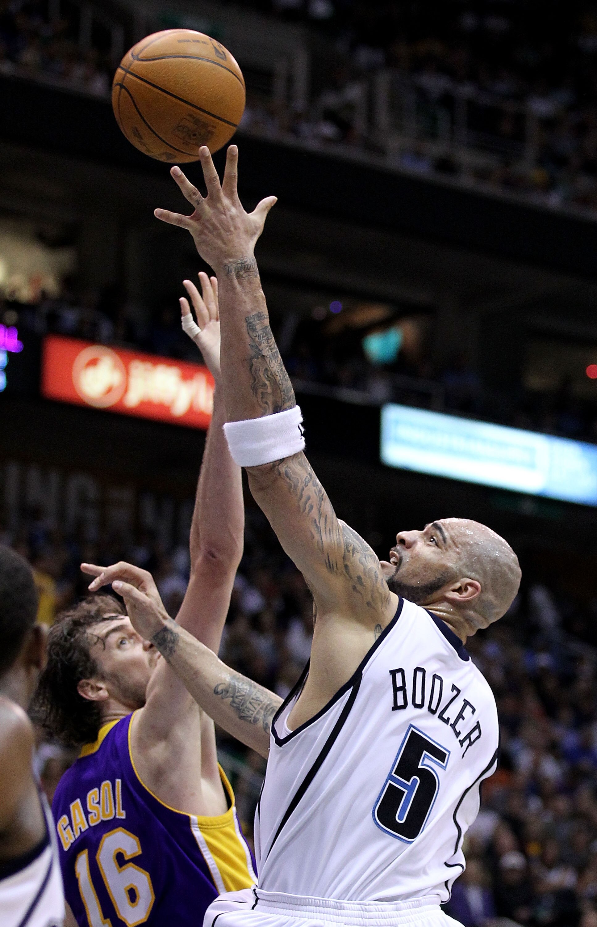 SALT LAKE CITY - MAY 10:  Carlos Boozer #5 of the Utah Jazz shoots over Pau Gasol #16 of the Los Angeles Lakers during Game Four of the Western Conference Semifinals of the 2010 NBA Playoffs on May 10, 2010 at Energy Solutions Arena in Salt Lake City, Uta