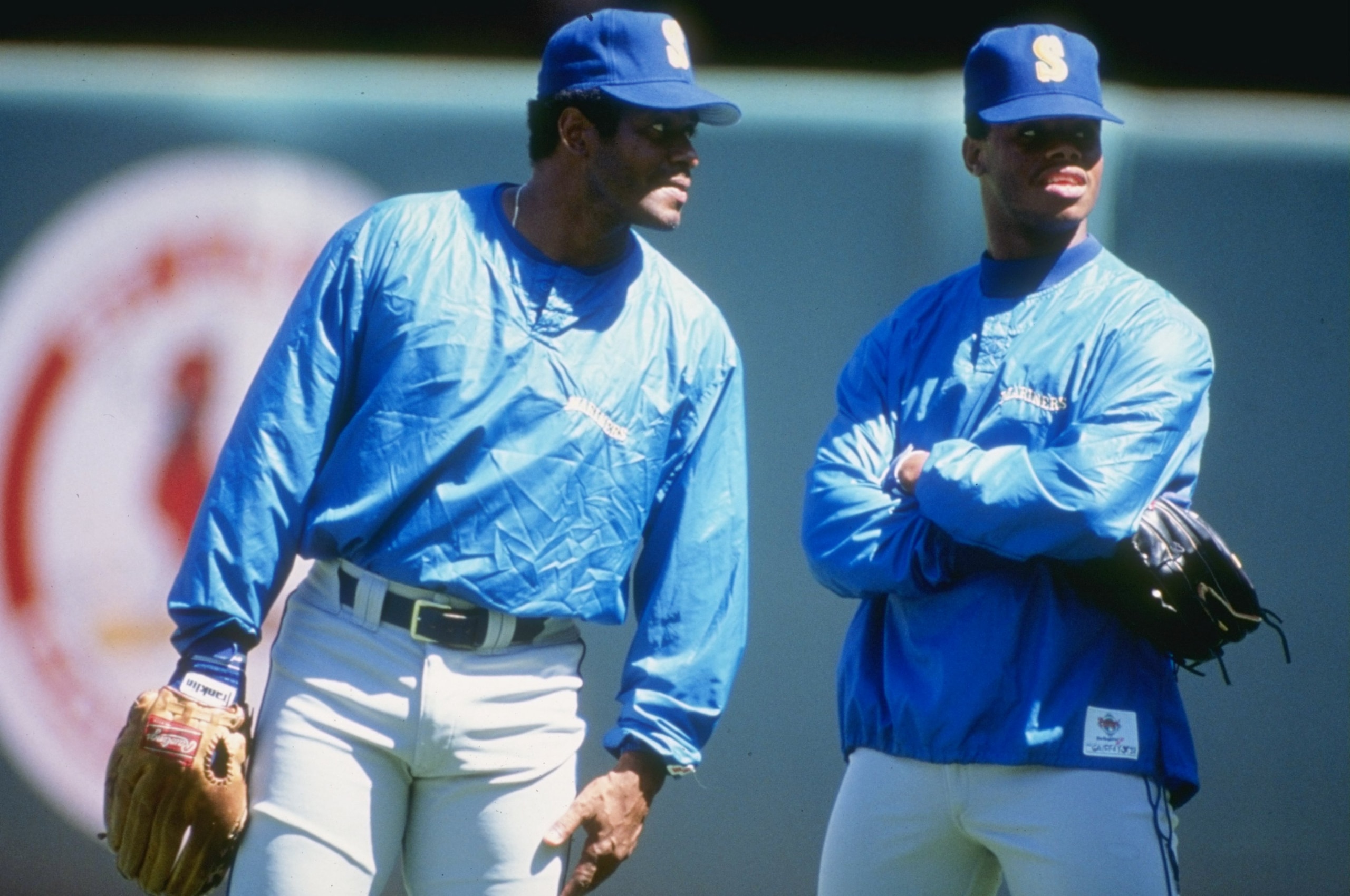 1990: Ken Griffey Jr. of the Seattle Mariners stands with his father Ken Griffey Sr. during a game. Mandatory Credit: Ken Levine /Allsport 1990: Ken Griffey Jr. of the Seattle Mariners stands with his father Ken Griffey Sr. during a game. Mandatory Credit: Ken Levine /Allsport