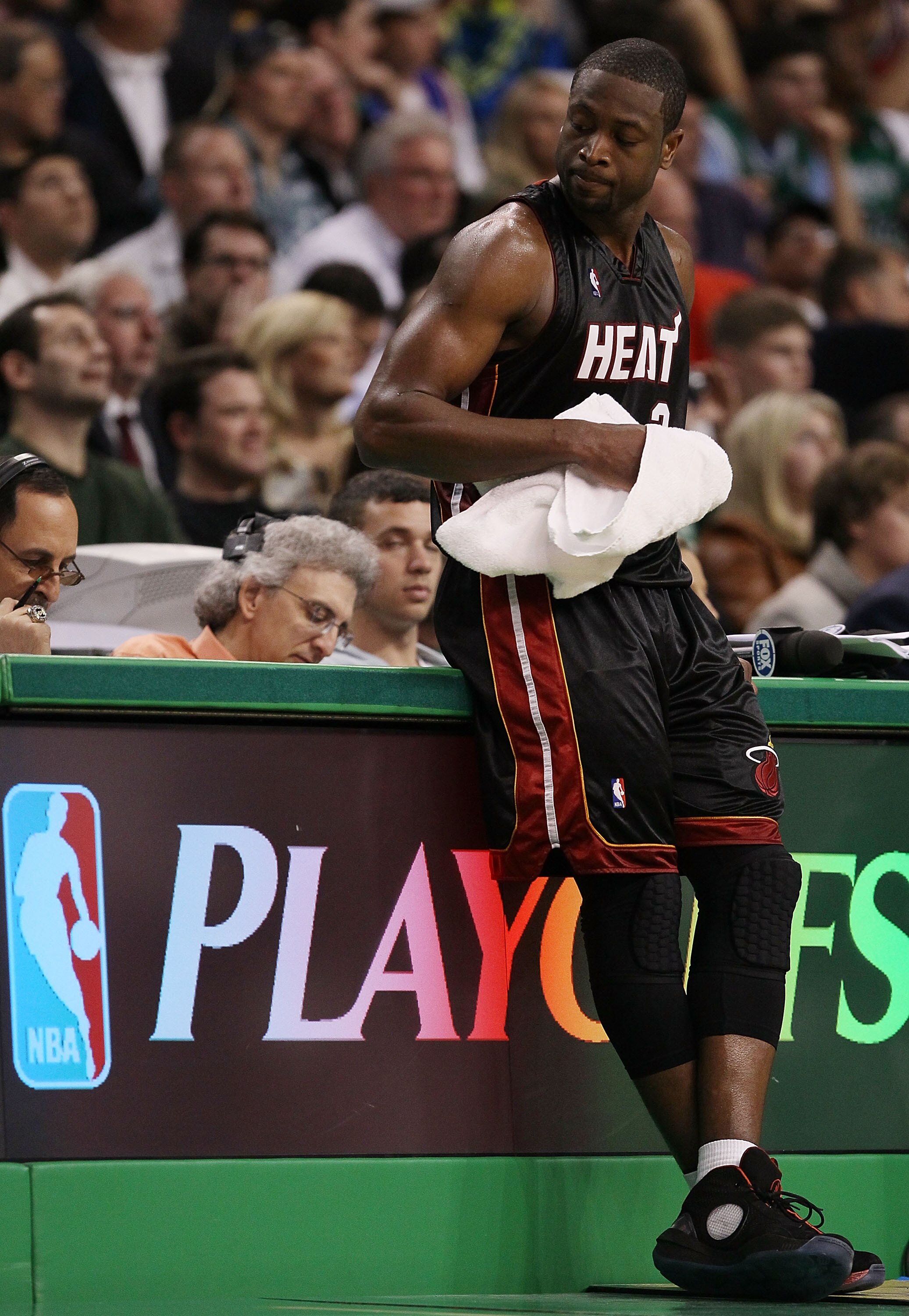 BOSTON - APRIL 27:  Dwyane Wade #3 of the Miami Heat waits near the bench as Ray Allen of the Boston Celtics shoots three free throws during Game Five of the Eastern Conference Quarterfinals of the 2010 NBA playoffs at the TD Garden on April 27, 2010 in B