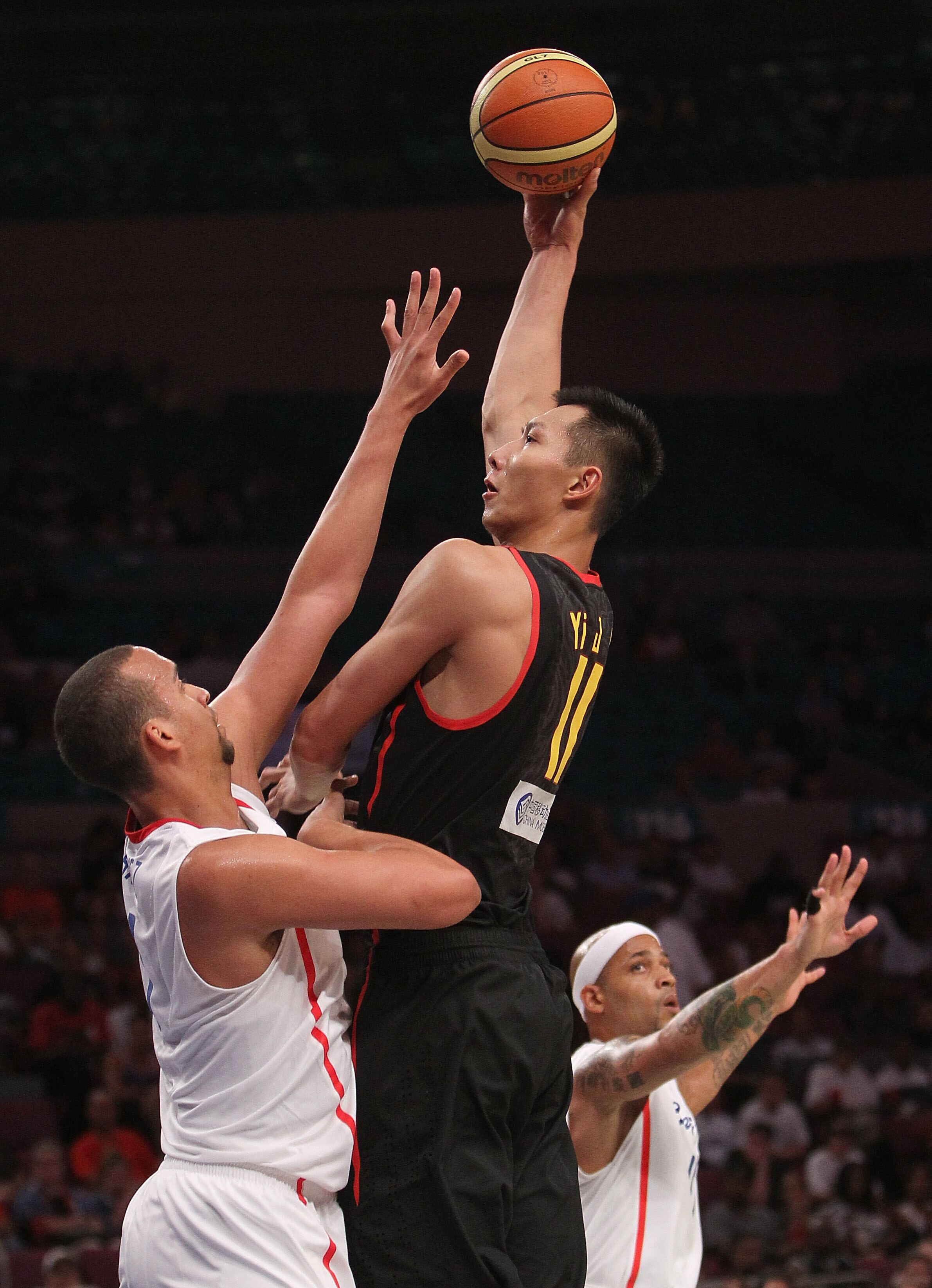 NEW YORK - AUGUST 15:  Yi Jianlian #11 of the China shoots the ball against Puerto Rico during their exhibition game as part of the World Basketball Festival at Madison Square Garden on August 15, 2010 in New York City.  (Photo by Nick Laham/Getty Images)