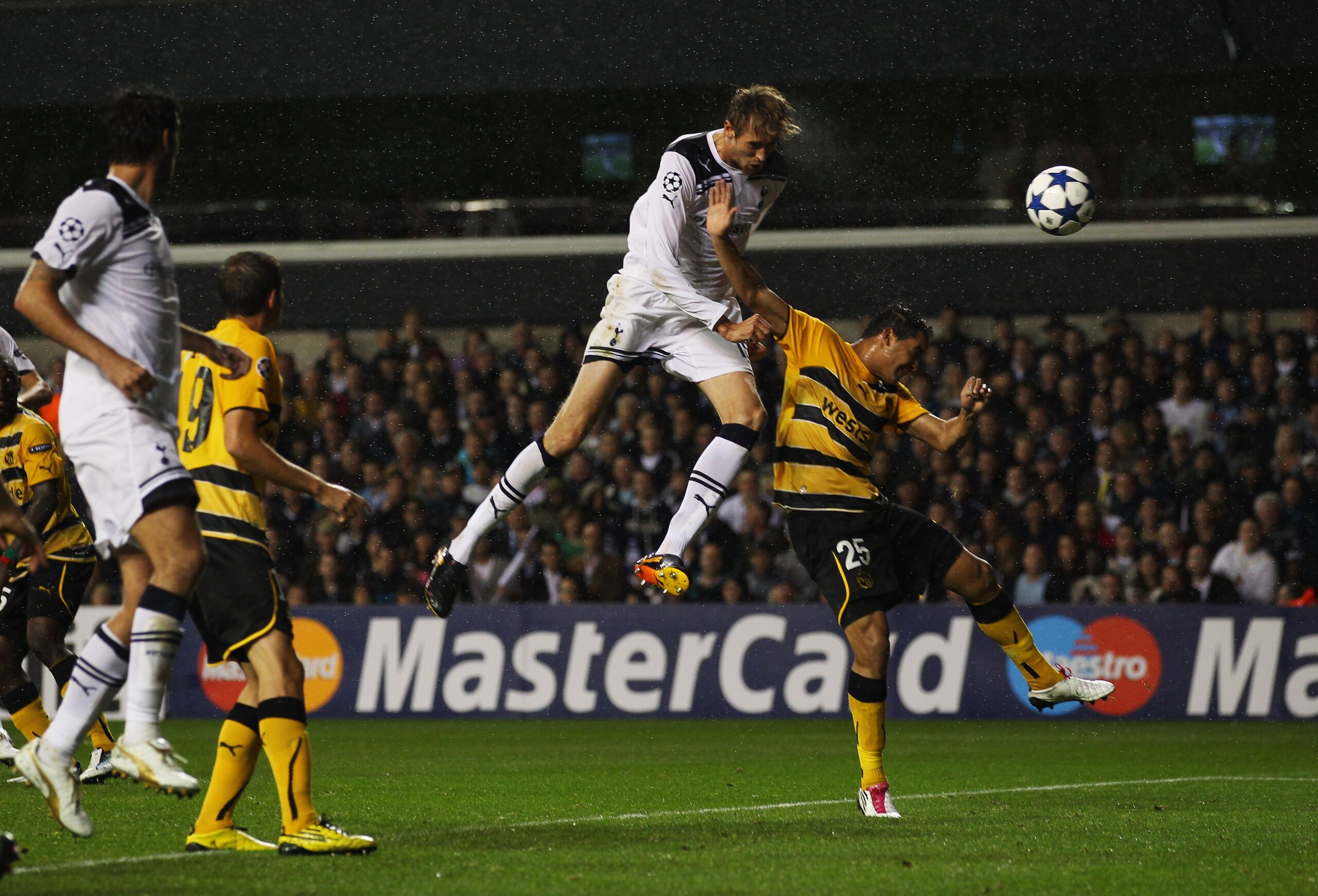LONDON, ENGLAND - AUGUST 25:  Peter Crouch of Tottenham Hotspur scores their third goal during the UEFA Champions League play-off second leg match between Tottenham Hotspur and BSC Young Boys at White Hart Lane on August 25, 2010 in London, England.  (Pho