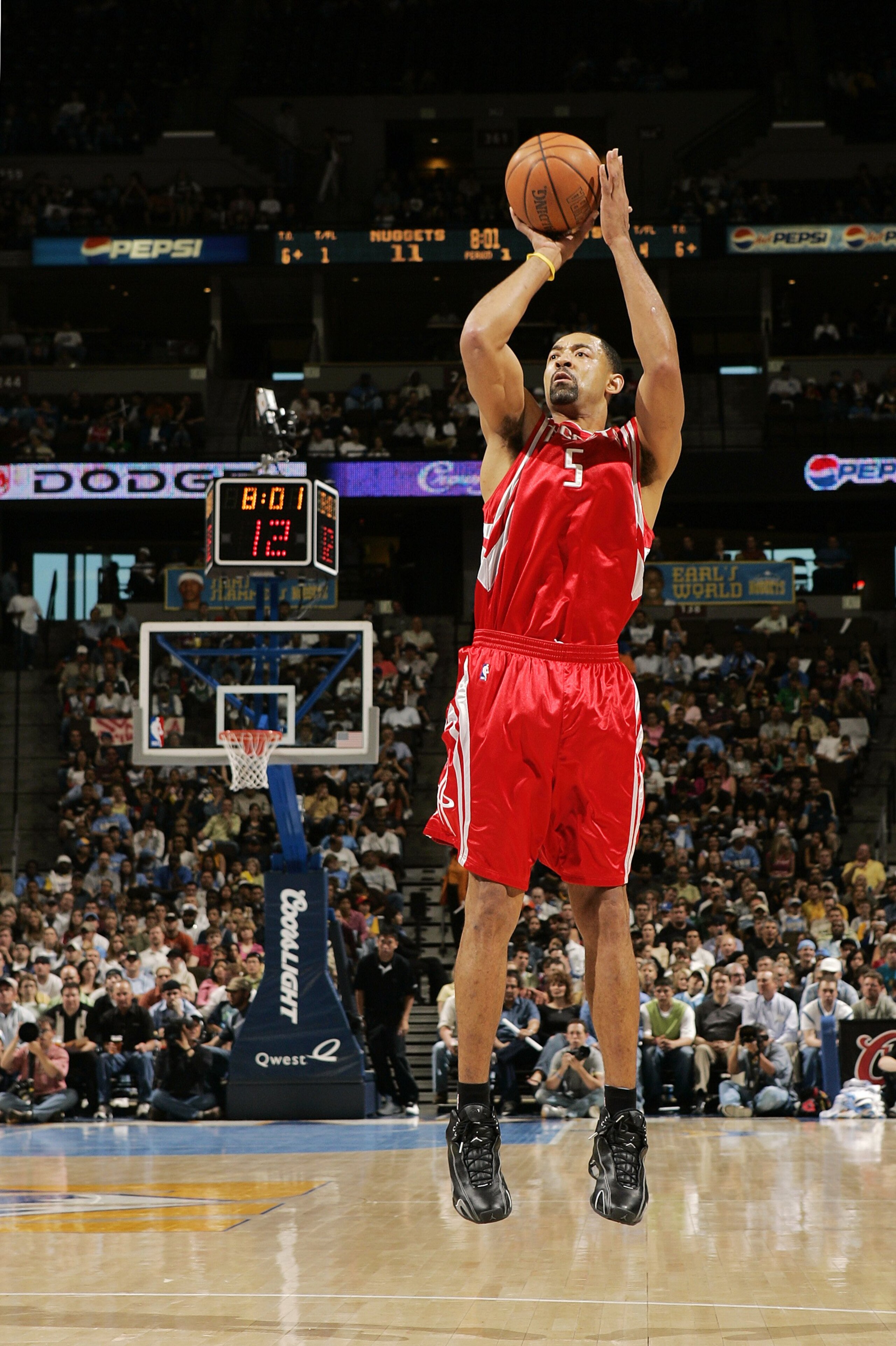 DENVER - APRIL 17:  Juwon Howard #5 of the Houston Rockets shoots against the Denver Nuggets in the first quarter on April 17, 2006 at the Pepsi Center in Denver, Colorado. Howard led with 31 points in the Rockets' 86-83 win.  NOTE TO USER: USER expressly