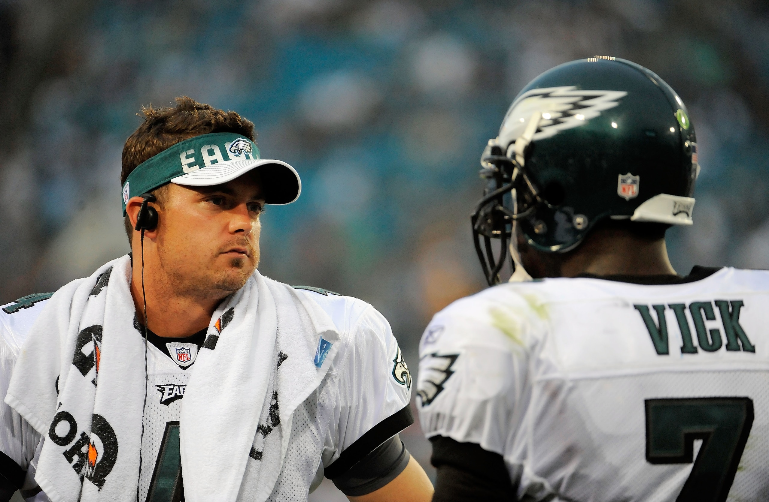 JACKSONVILLE, FL - SEPTEMBER 26:  Quarterbacks Kevin Kolb #4 and Michael Vick #7 of the Philadelphia Eagles talk on the sidelines during a time-out against the Jacksonville Jaguars at EverBank Field on September 26, 2010 in Jacksonville, Florida. The Eagl