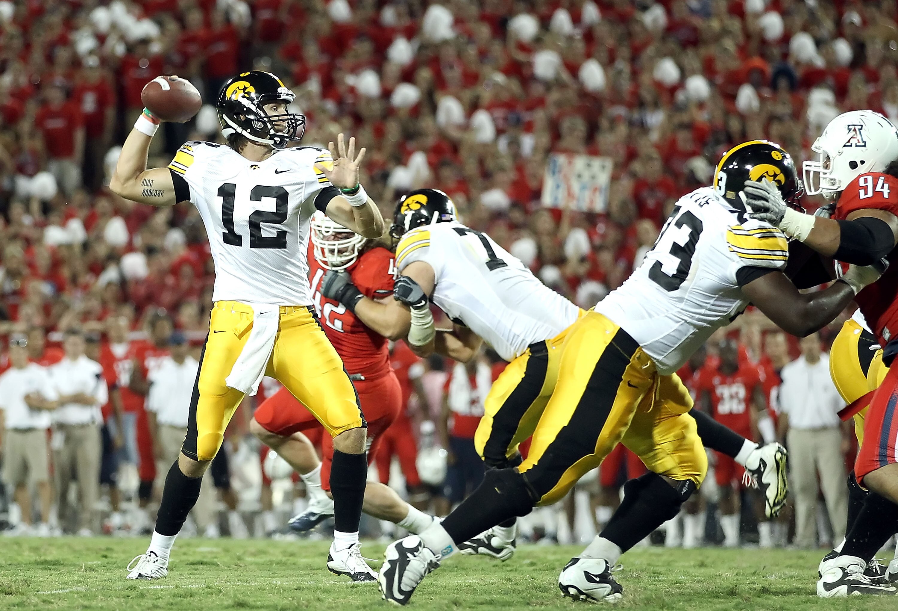 TUCSON, AZ - SEPTEMBER 18:  Quarterback Ricky Stanzi #12 of the Iowa Hawkeyes in action during the college football game against the Arizona Wildcats at Arizona Stadium on September 18, 2010 in Tucson, Arizona.  The Wildcats defeated the Hawkeyes 34-27.