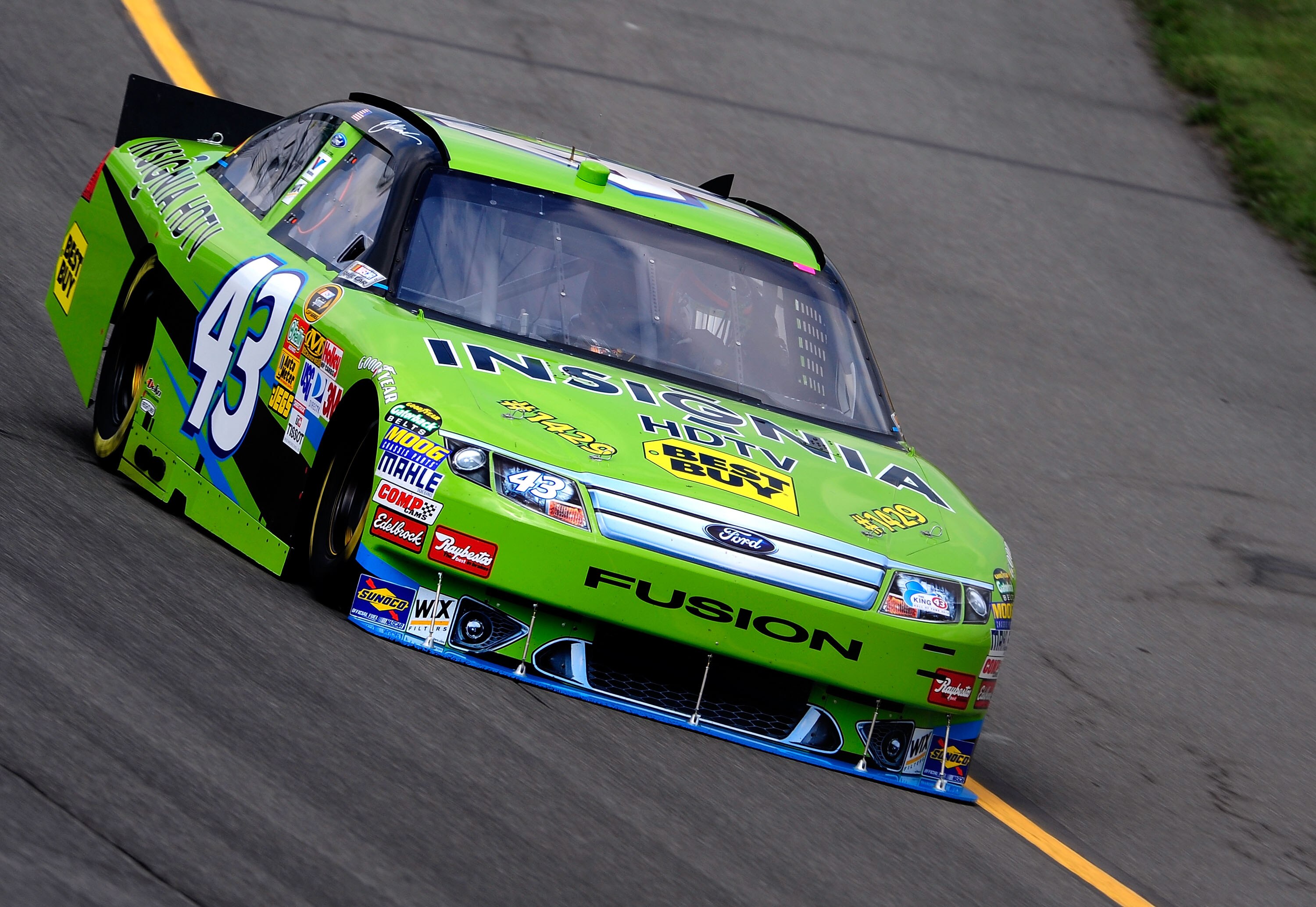 BROOKLYN, MI - AUGUST 13:  AJ Allmendinger, driver of the #43 Insignia HDTV Ford, drives on track during practice for the NASCAR Sprint Cup Series CARFAX 400 at Michigan International Speedway on August 13, 2010 in Brooklyn, Michigan.  (Photo by Rusty Jar