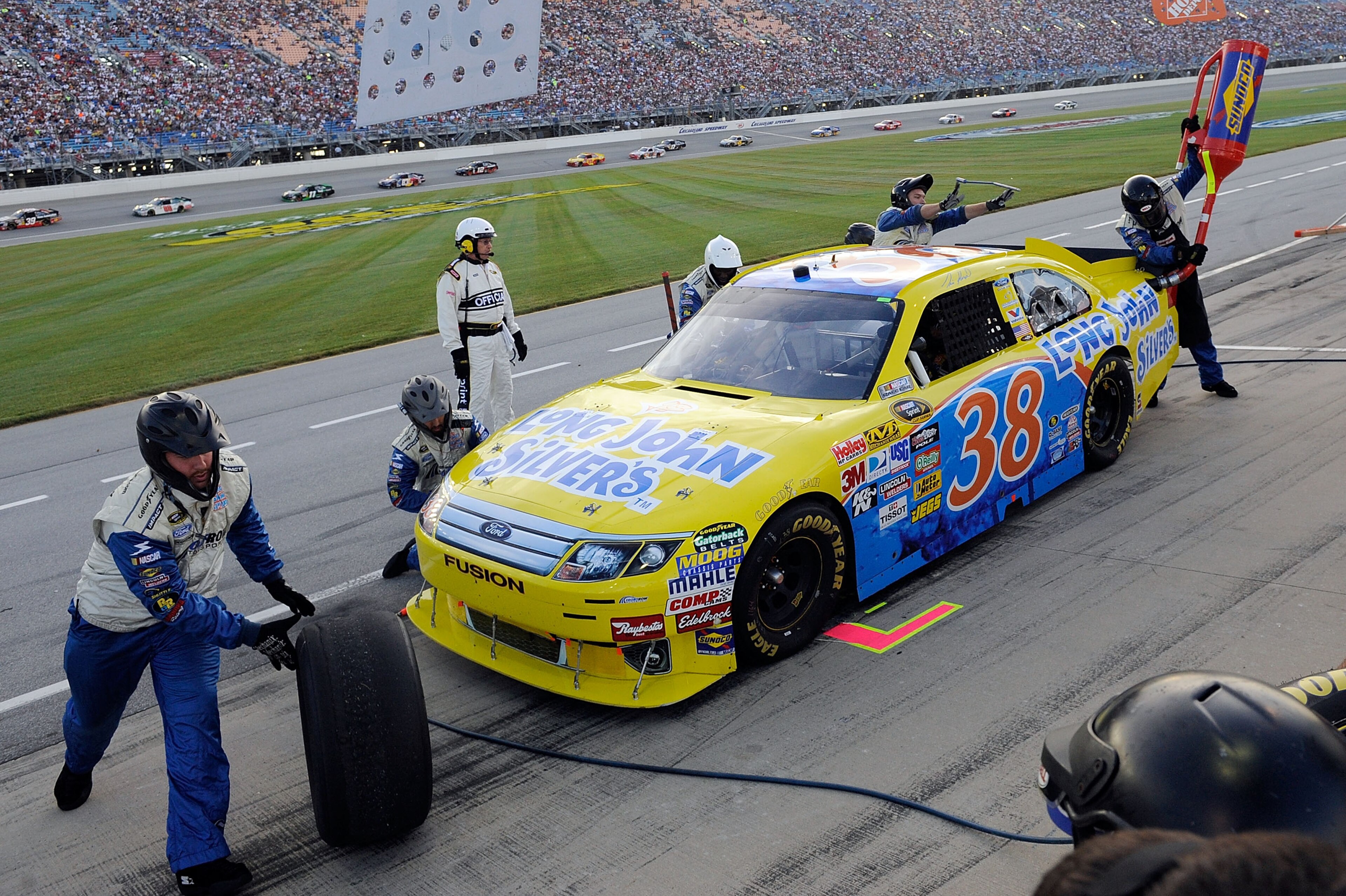 JOLIET, IL - JULY 10:  Travis Kvapil, driver of the #38 Long John Silver's Ford. pits during the NASCAR Sprint Cup Series LIFELOCK.COM 400 at the Chicagoland Speedway on July 10, 2010 in Joliet, Illinois.  (Photo by John Harrelson/Getty Images for NASCAR)