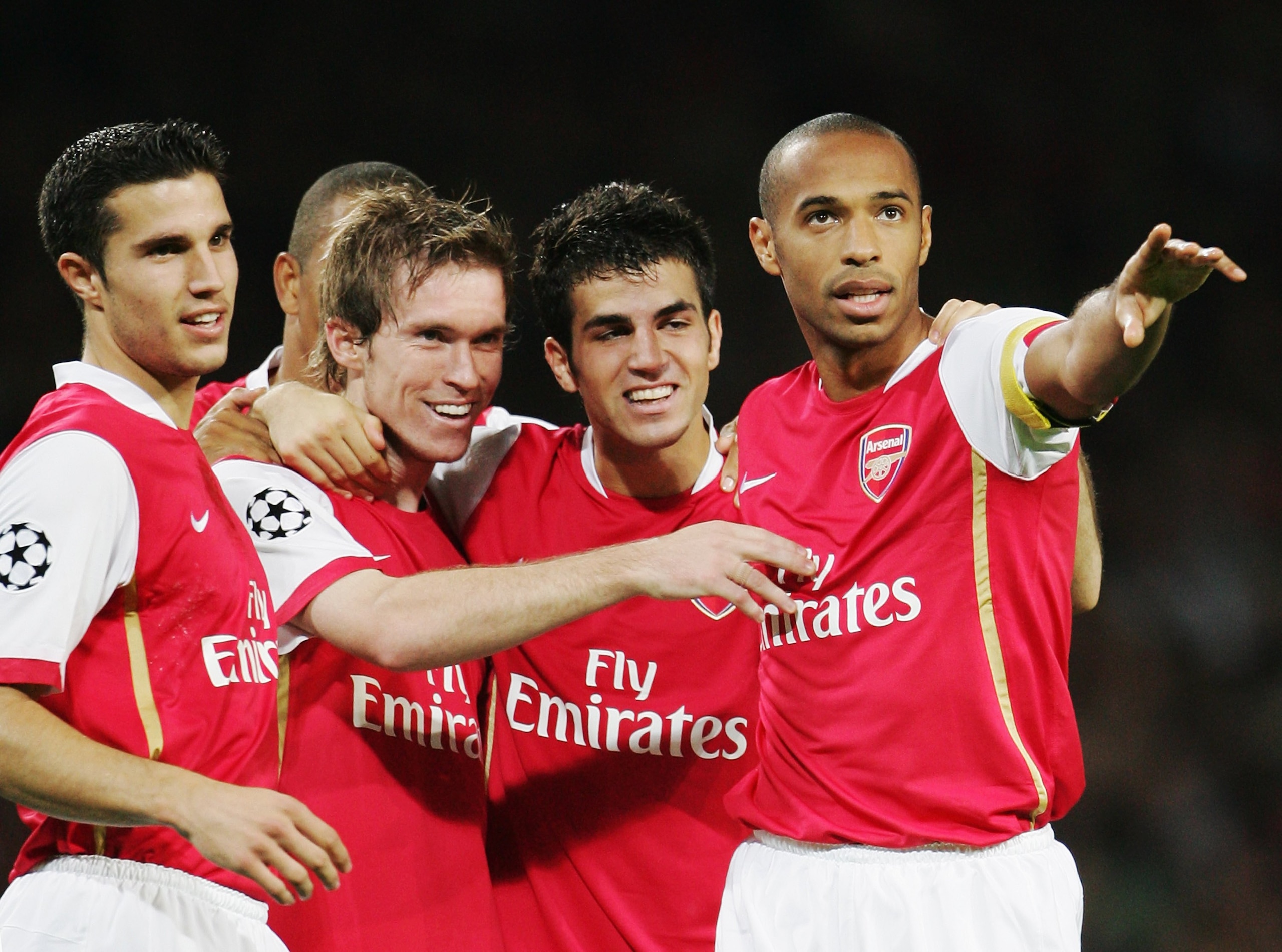 LONDON - SEPTEMBER 26:  Alexander Hleb (2nd left) of Arsenal celebrates scoring the second goal with team mates Robin Van Persie (1st left), Francesc Fabregas (2nd right) and Thierry Henry (right)  during the UEFA Champions League Group G match between Ar