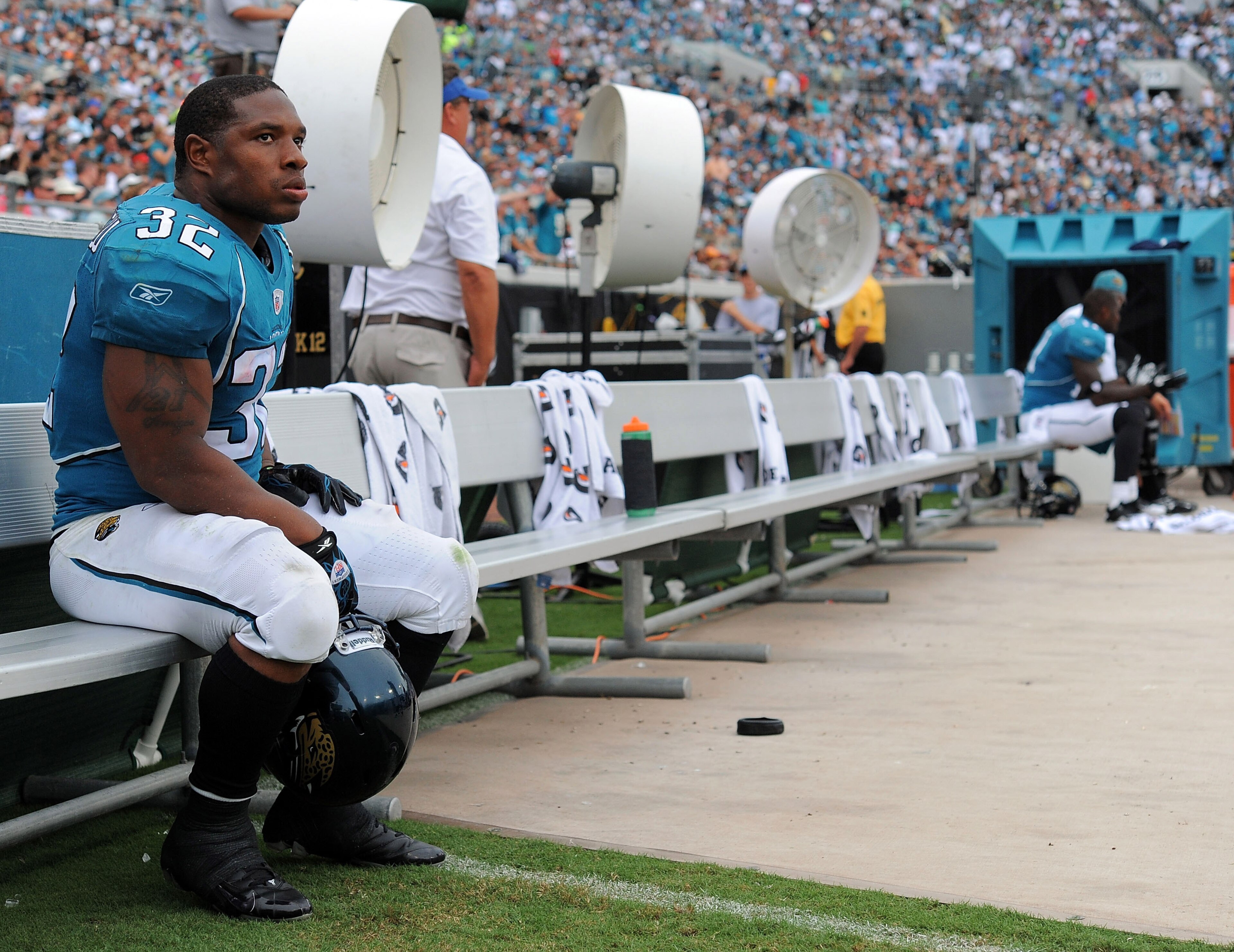 JACKSONVILLE, FL - SEPTEMBER 26: Running back Maurice Jones-Drew #32 of the Jacksonville Jaguars sits on the sidelines watching his team take on the Philadelphia Eagles at EverBank Field on September 26, 2010 in Jacksonville, Florida. The Eagles defeated JACKSONVILLE, FL - SEPTEMBER 26: Running back Maurice Jones-Drew #32 of the Jacksonville Jaguars sits on the sidelines watching his team take on the Philadelphia Eagles at EverBank Field on September 26, 2010 in Jacksonville, Florida. The Eagles defeated