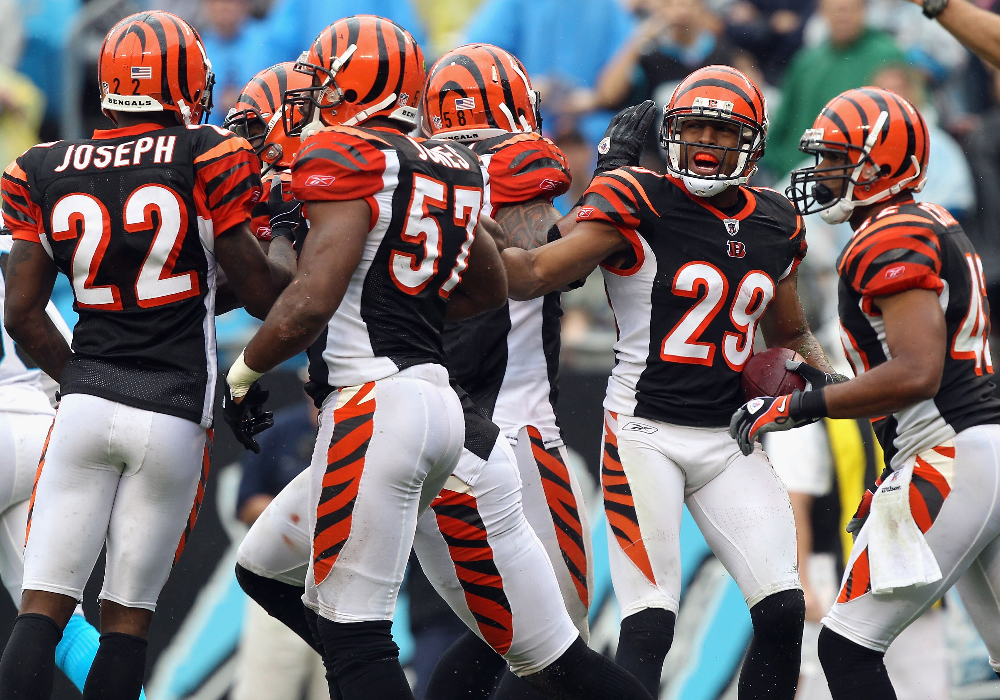 CHARLOTTE, NC - SEPTEMBER 26:  Leon Hall #29 of the Cincinnati Bengals celebrates with teammates after making an interception against the Carolina Panthers during their game at Bank of America Stadium on September 26, 2010 in Charlotte, North Carolina.  (