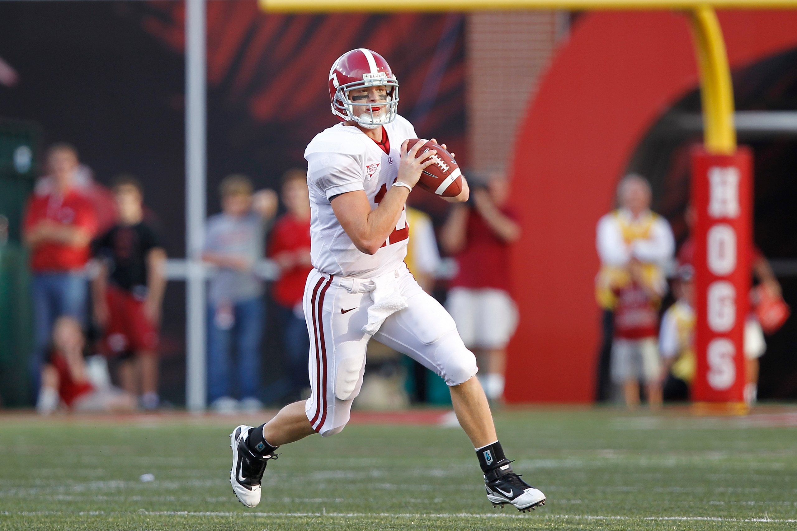FAYETTEVILLE - SEPTEMBER 25: Greg McElroy #12 of the Alabama Crimson Tide looks to pass against the Arkansas Razorbacks at Donald W. Reynolds Razorback Stadium on September 25, 2010 in Fayetteville, Arkansas. Alabama won 24-20. (Photo by Joe Robbins/Getty