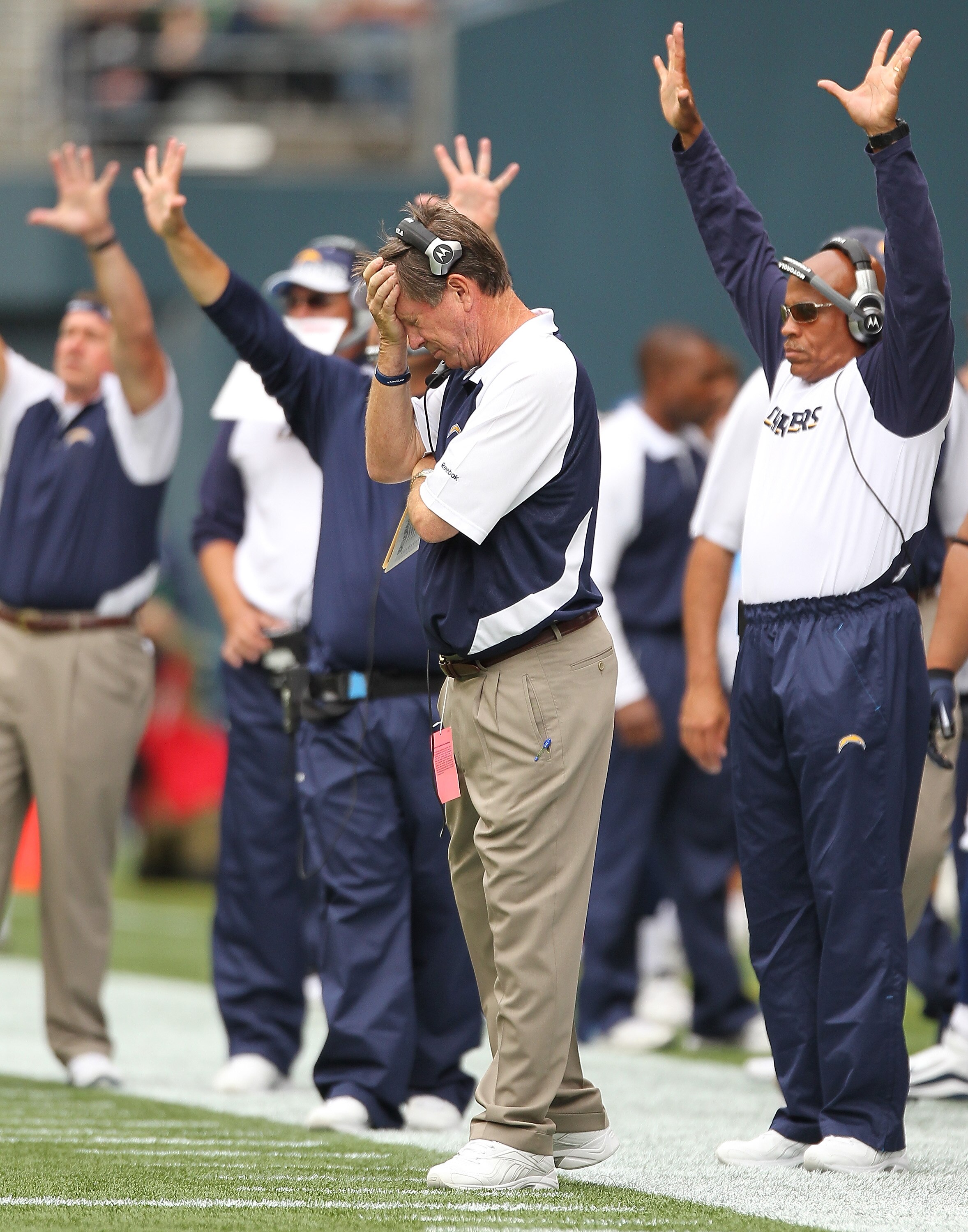 SEATTLE - SEPTEMBER 26:  Head coach Norv Turner of the San Diego Chargers holds his head during the game against the Seattle Seahawks at Qwest Field on September 26, 2010 in Seattle, Washington. The Seahawks defeated the Chargers 27-20. (Photo by Otto Gre