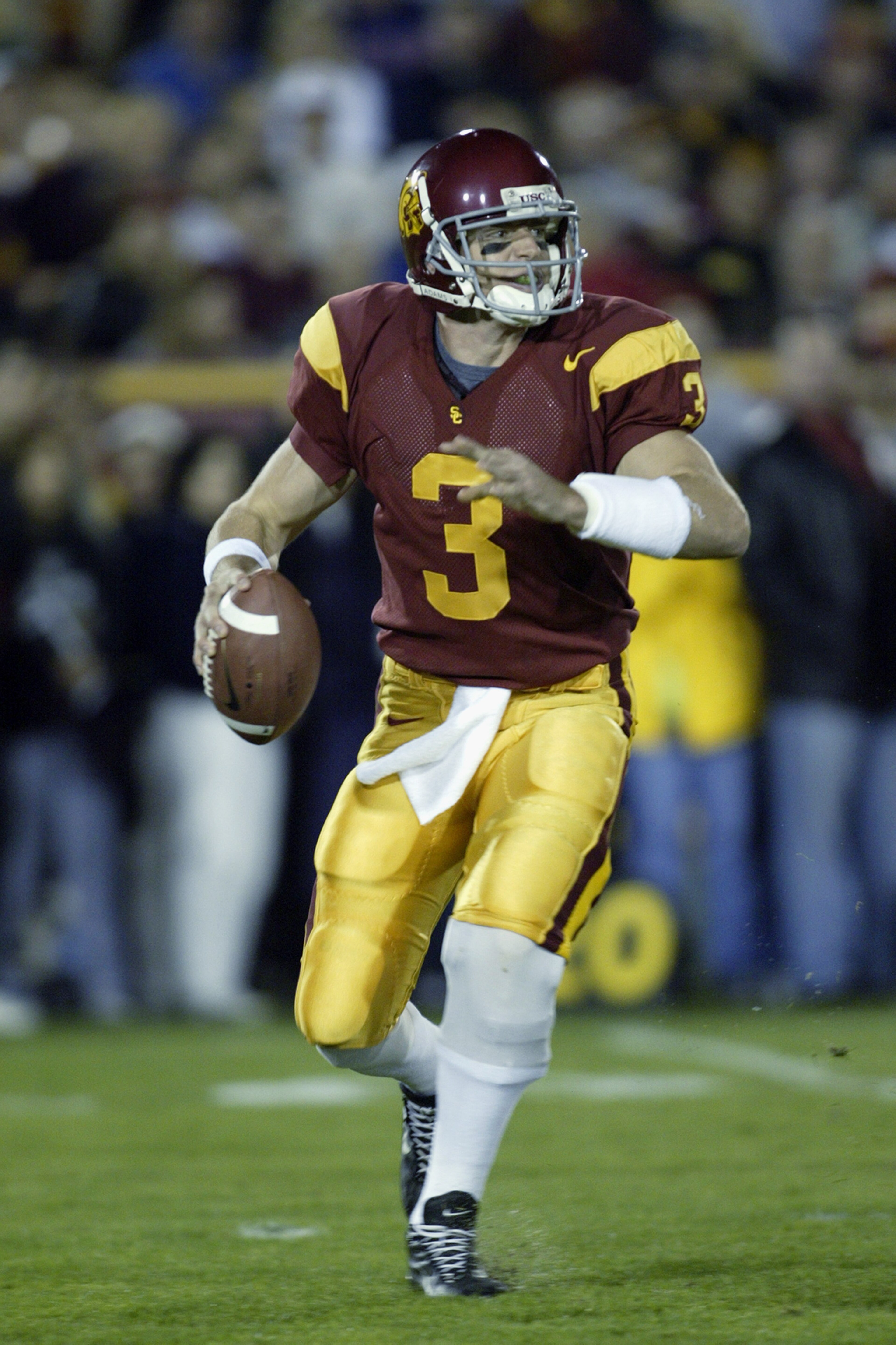 LOS ANGELES - NOVEMBER 30:  Quarterback Carson Palmer #3 of the University of Southern California Trojans attempts to pass against the University of Notre Dame Fighting Irish during the game at the Los Angeles Memorial Coliseum on November 30, 2002 in Los