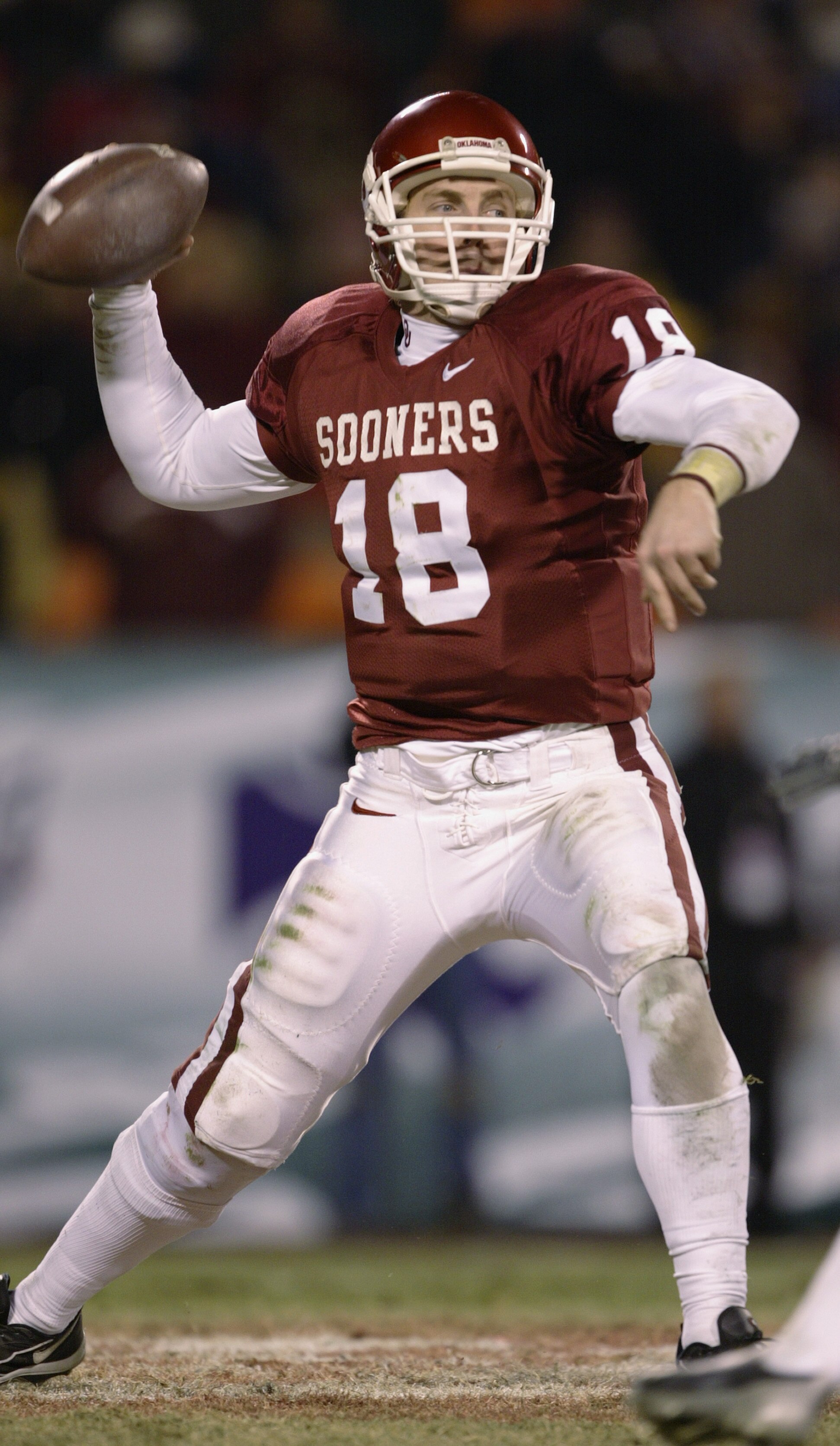 KANSAS CITY, MO - DECEMBER 6:  Quarterback Jason White #18 of the Oklahoma Sooners throws the ball during the game against the Kansas State Wildcats in the Dr. Pepper Big 12 Championship on December 6, 2003 at Arrowhead Stadium in Kansas City, Missouri.