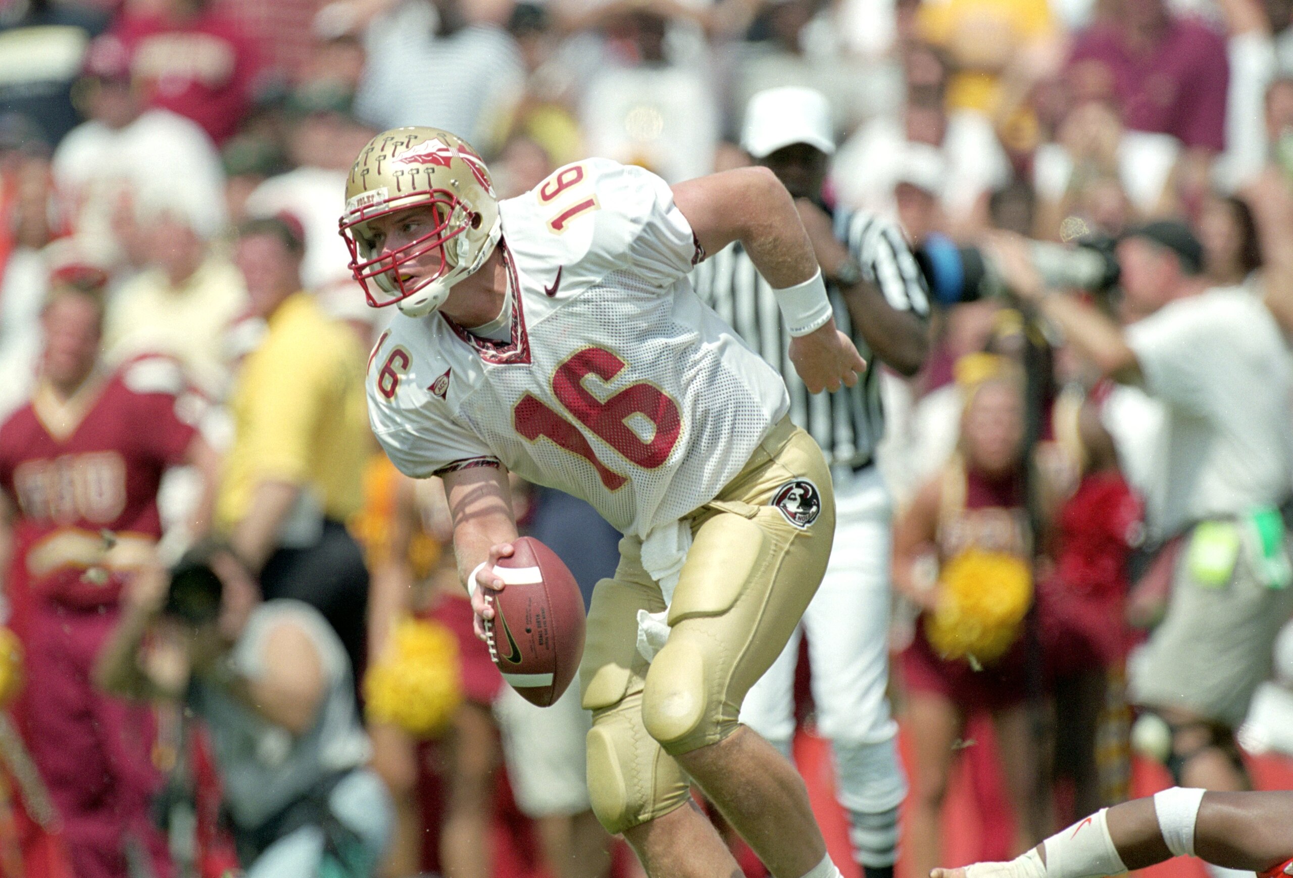 7 Oct 2000: Chris Weinke #16 of the Florida State Seminoles moves with the ball during the game against the Miami Hurricanes at the Orange Bowl in Miami, Florida.  The Hurricanes defeated the Seminoles 27-24.Mandatory Credit: Eliot J. Schechter  /Allsport