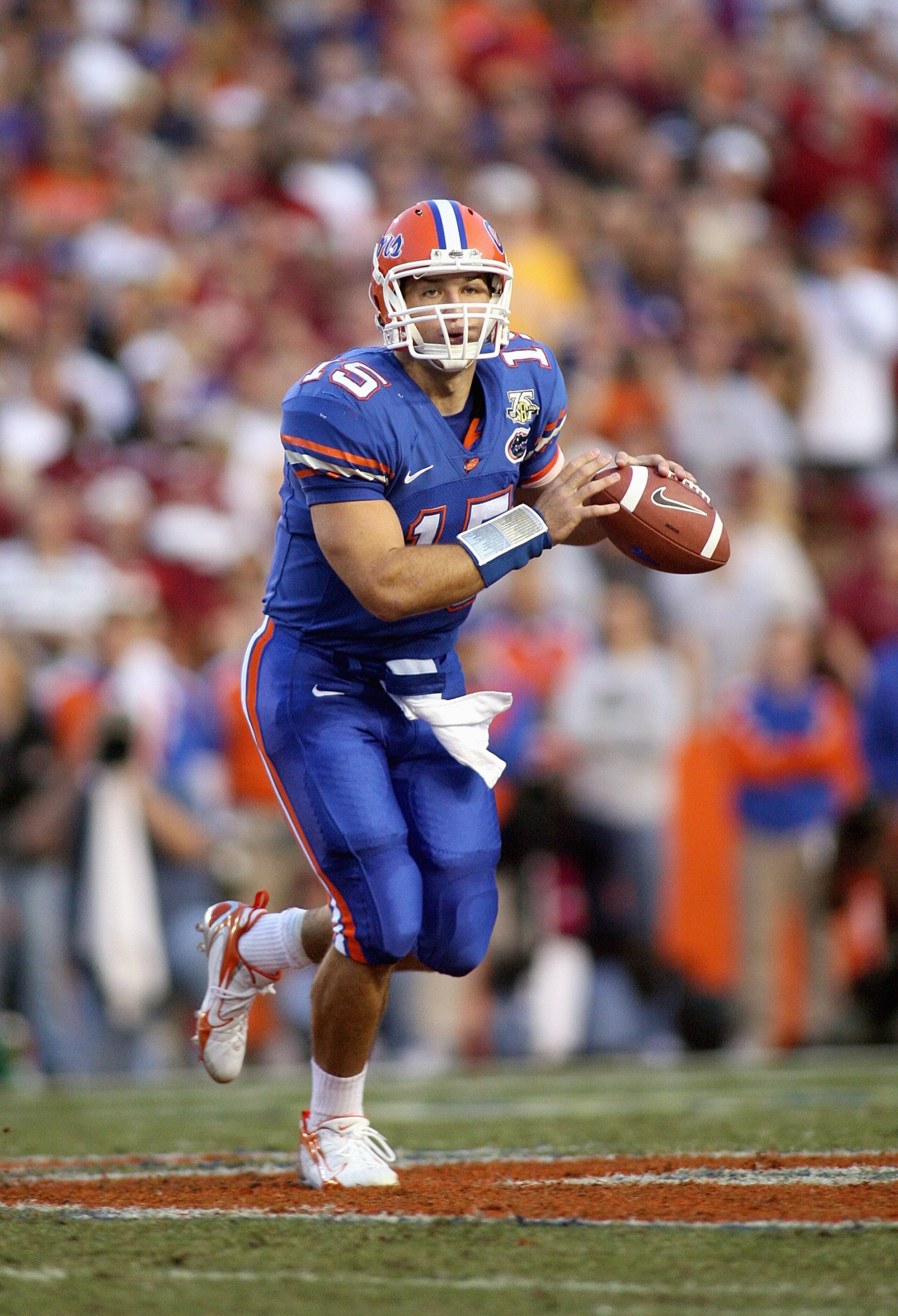 GAINESVILLE, FL - NOVEMBER 24: Quarterback Tim Tebow #15 of the Florida Gators rolls out against the Florida State Seminoles at Ben Hill Griffin Stadium November 24, 2007 in Gainesville, Florida. (Photo by Marc Serota/Getty Images)