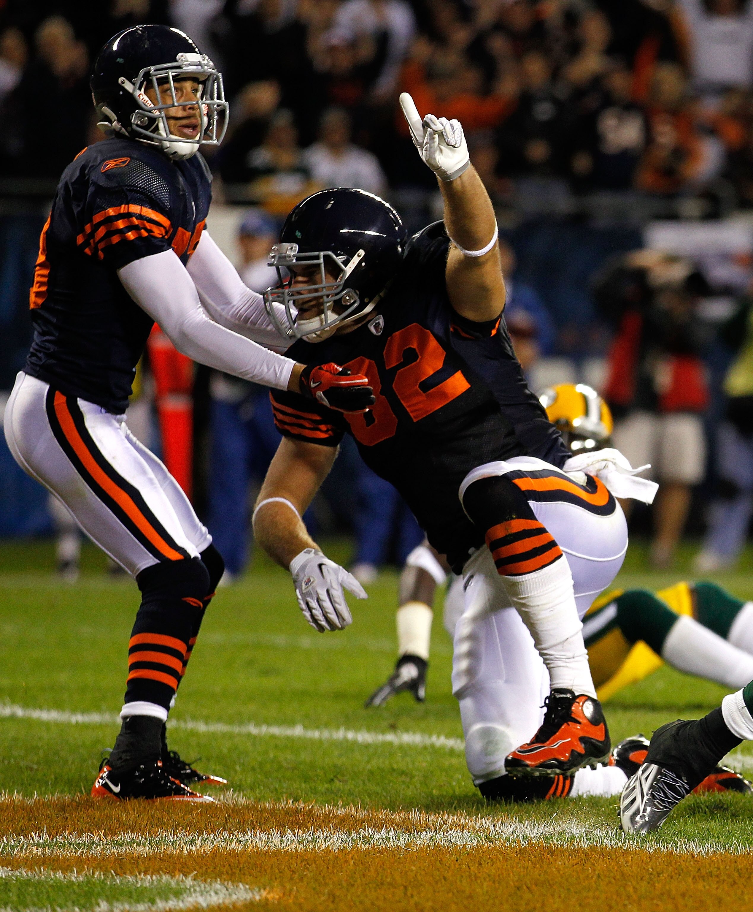 CHICAGO - SEPTEMBER 27: (L-R) Johnny Knox #13 and Greg Olsen #82 of the Chicago Bears celebrate after Olsen scored a 9-yard touchdown in the second quarter against the Green Bay Packers at Soldier Field on September 27, 2010 in Chicago, Illinois. (Photo CHICAGO - SEPTEMBER 27: (L-R) Johnny Knox #13 and Greg Olsen #82 of the Chicago Bears celebrate after Olsen scored a 9-yard touchdown in the second quarter against the Green Bay Packers at Soldier Field on September 27, 2010 in Chicago, Illinois. (Photo