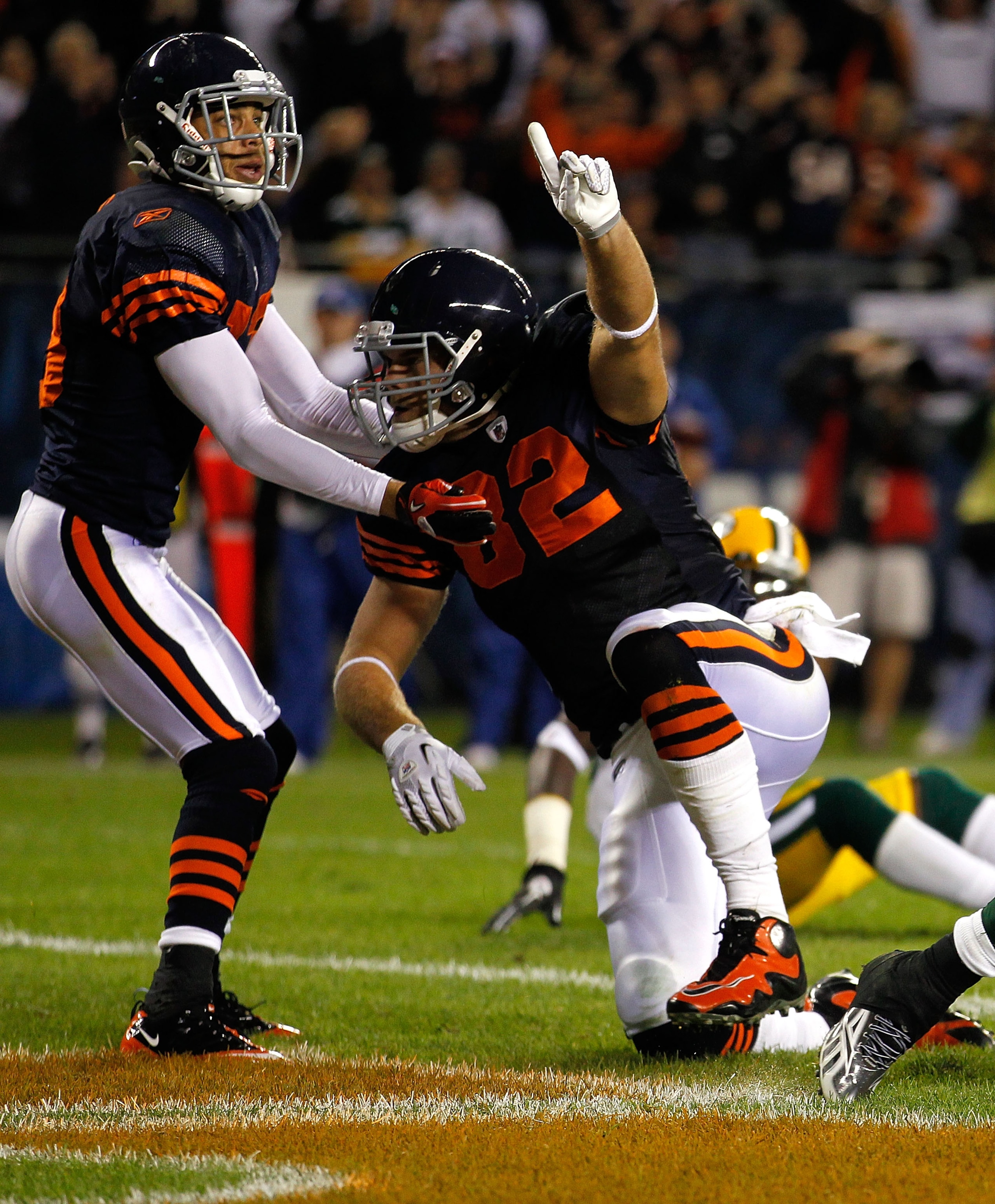 CHICAGO - SEPTEMBER 27:  (L-R) Johnny Knox #13 and Greg Olsen #82 of the Chicago Bears celebrate after Olsen scored a 9-yard touchdown in the second quarter against the Green Bay Packers at Soldier Field on September 27, 2010 in Chicago, Illinois.  (Photo