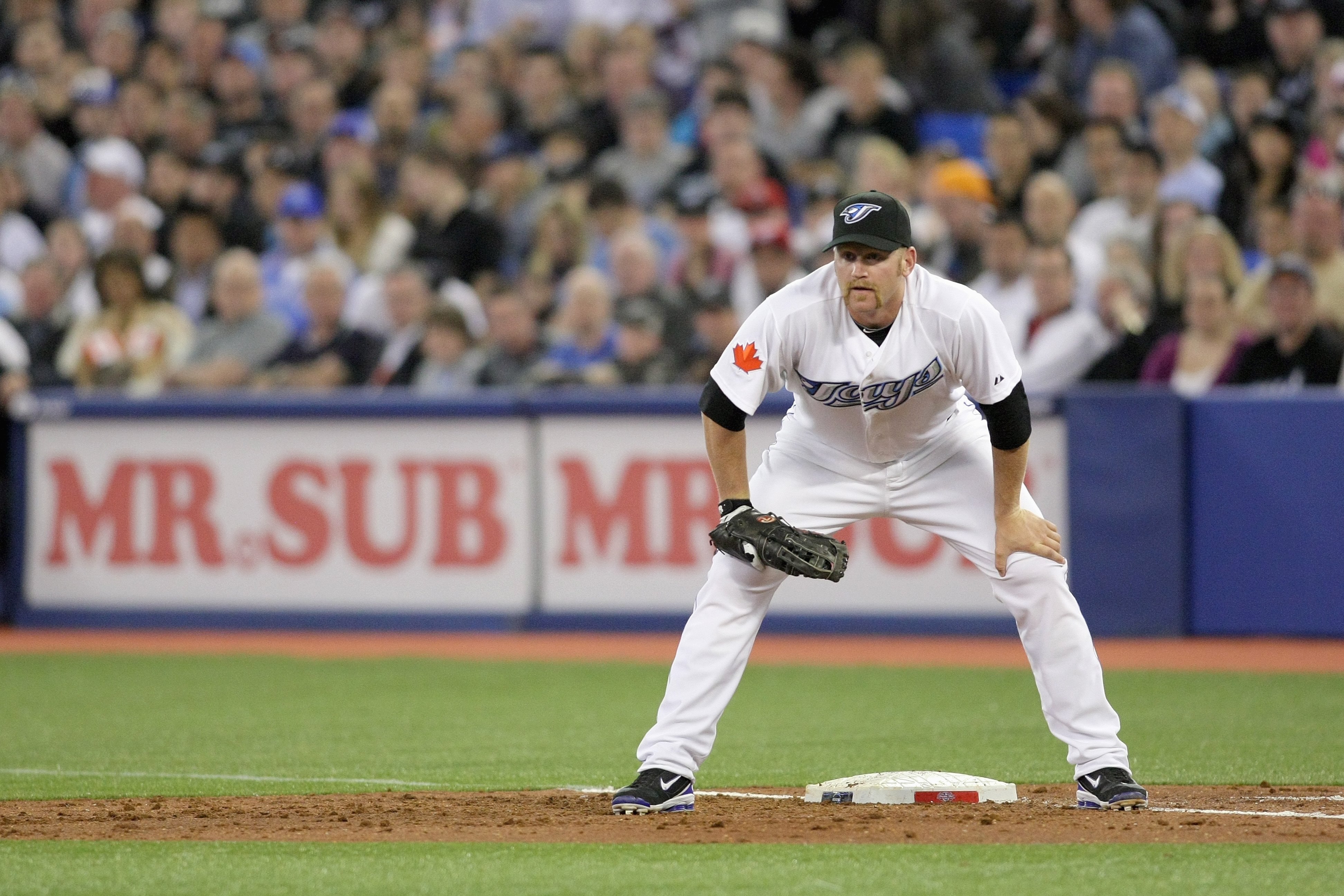 TORONTO - APRIL 12:  Lyle Overbay #45 of the Toronto Blue Jays waits at first base during the game against the Chicago White Sox at the Rogers Centre on April 12, 2010 in Toronto, Ontario. (Photo By Dave Sandford/Getty Images)