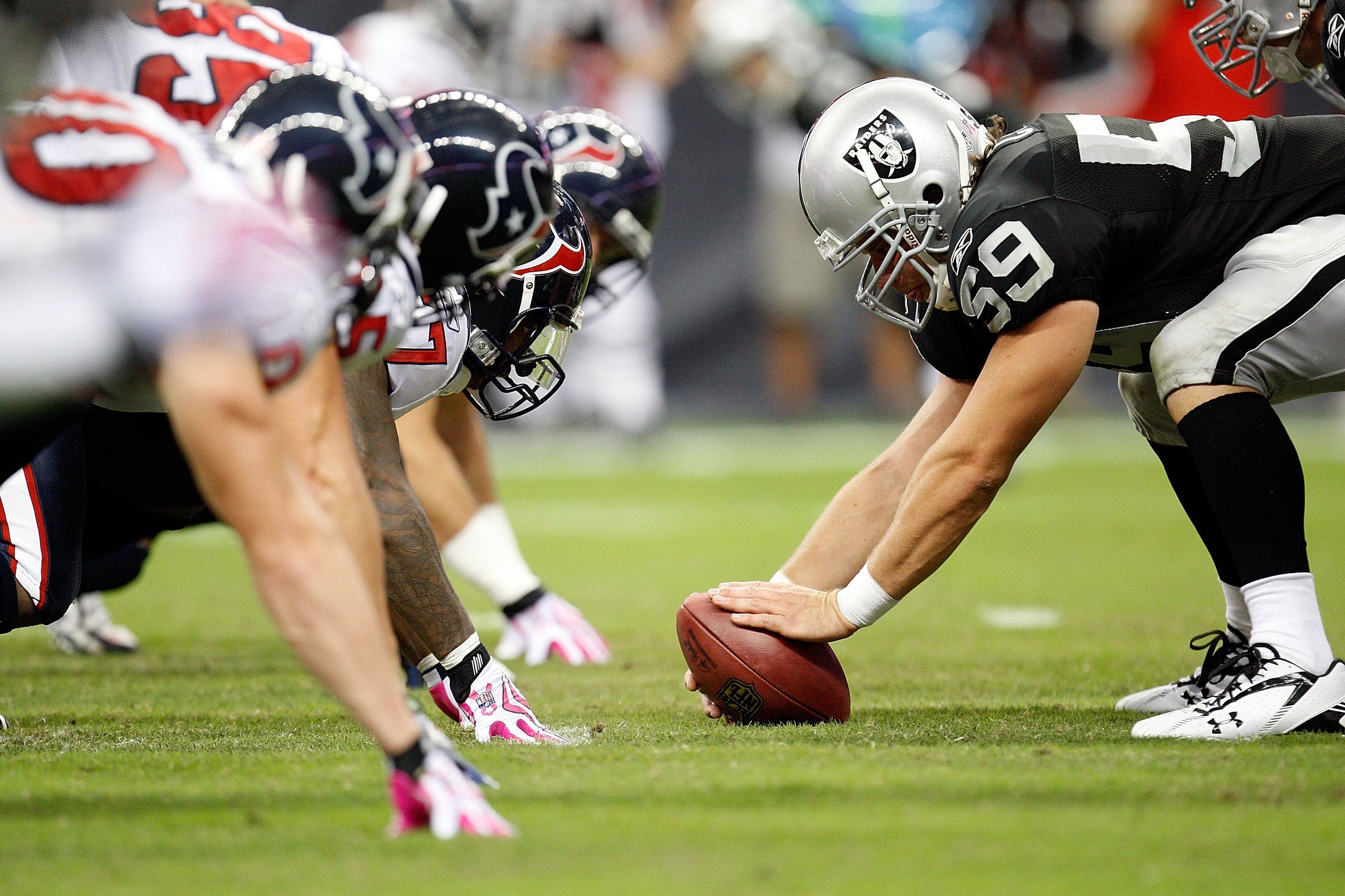 HOUSTON - OCTOBER 04:  Center Jon Condo #59 of the Oakland Raiders at Reliant Stadium on October 4, 2009 in Houston, Texas.  (Photo by Ronald Martinez/Getty Images)