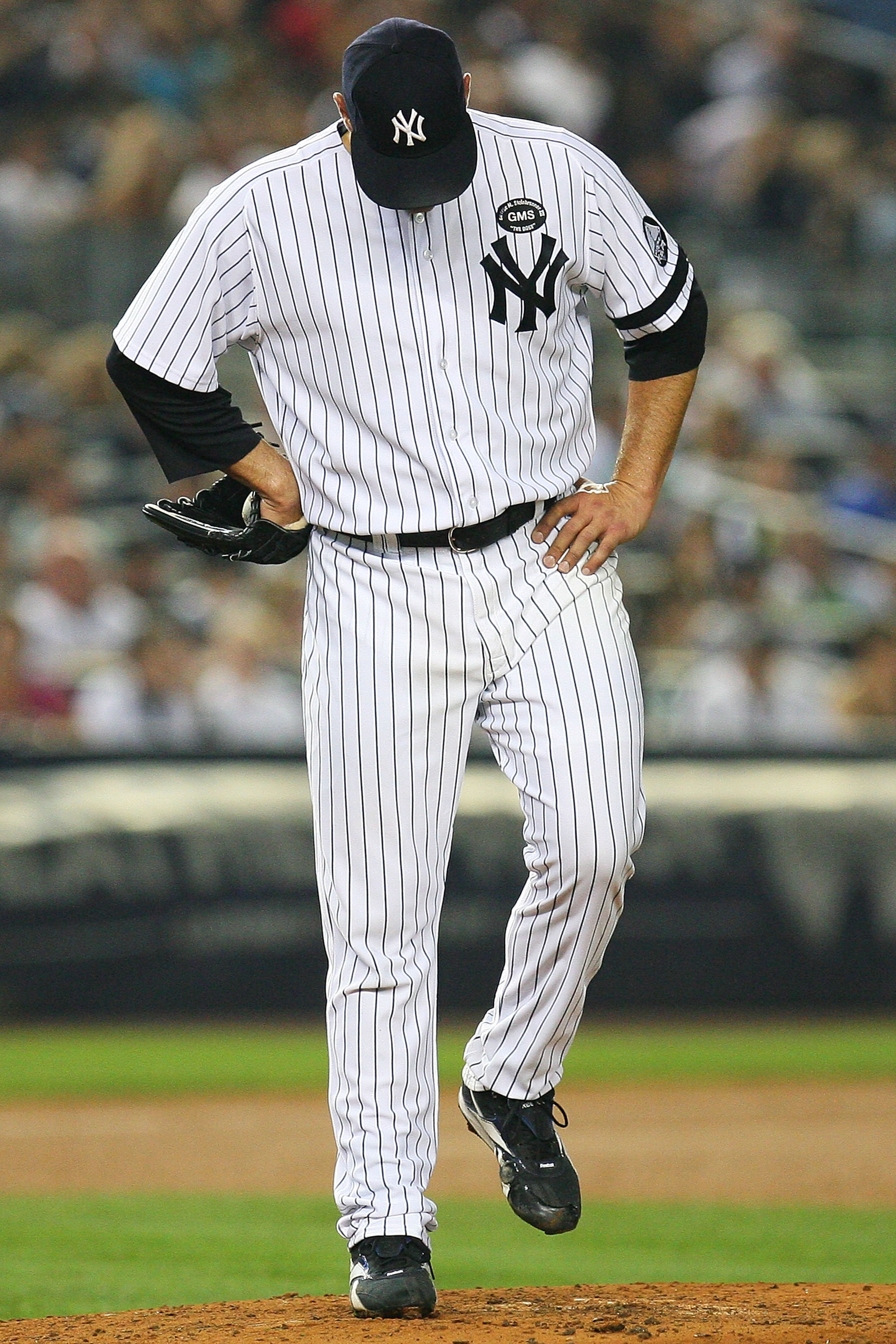 NEW YORK - SEPTEMBER 24:  Andy Pettitte #46 of the New York Yankees kicks the mound during a game against the Boston Red Sox on September 24, 2010 at Yankee Stadium in the Bronx borough of New York City.  (Photo by Andrew Burton/Getty Images)