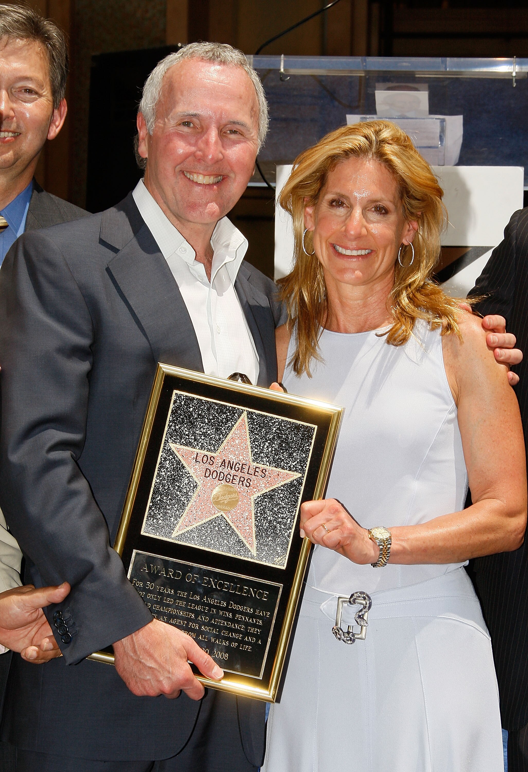 HOLLYWOOD - JUNE 20:  Team owner Frank McCourt (L) and wife Jamie attend a special star ceremony honoring the Los Angeles Dodgers with an Award of Excellence on the Hollywood Walk of Fame on June 20, 2008 in Hollywood, California.  (Photo by Vince Bucci/G
