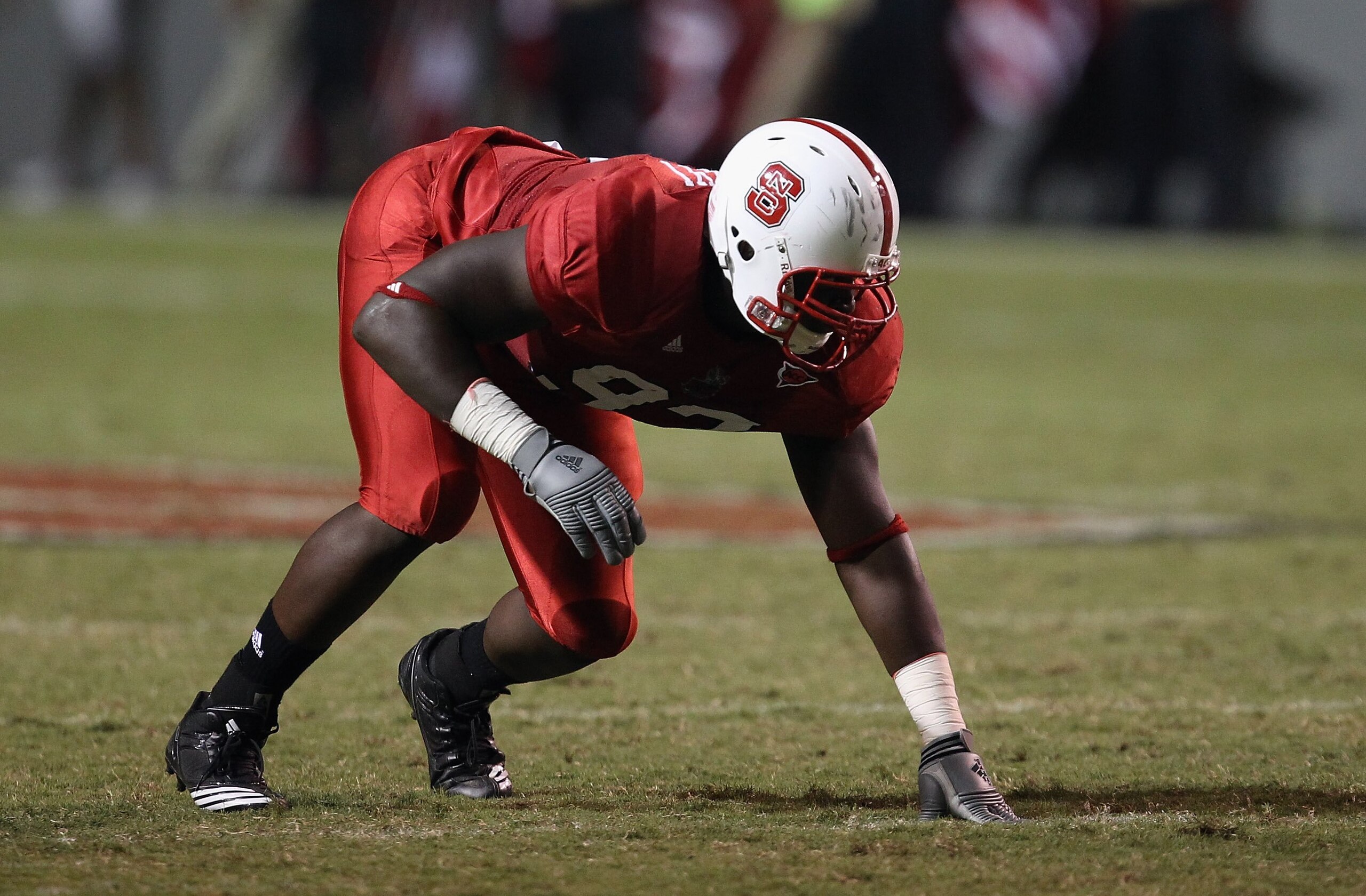 RALEIGH, NC - SEPTEMBER 16:  David Akinniyi #97 of the North Carolina State Wolfpack during their game at Carter-Finley Stadium on September 16, 2010 in Raleigh, North Carolina.  (Photo by Streeter Lecka/Getty Images)
