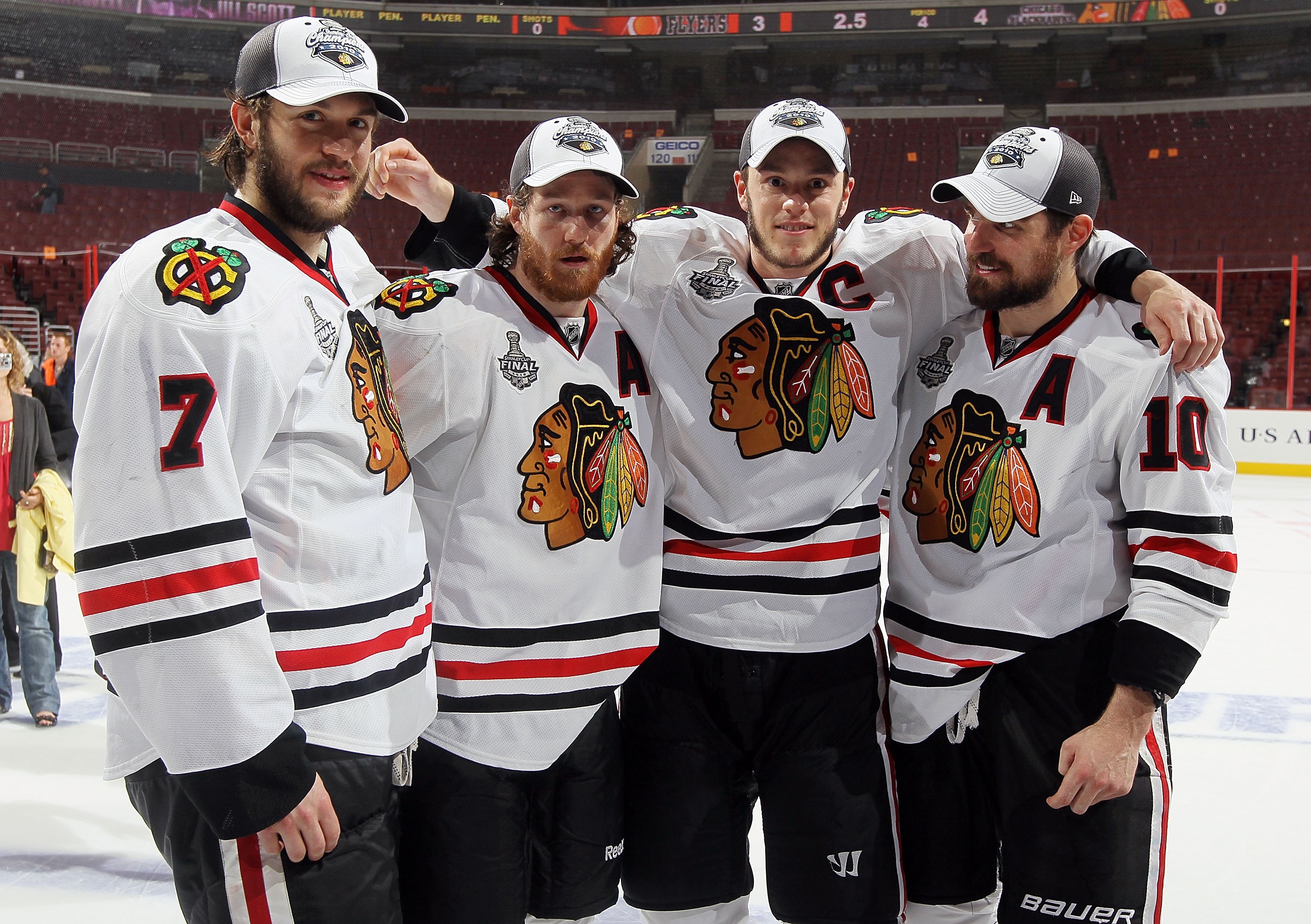 PHILADELPHIA - JUNE 09: (L-R) Brent Seabrook #7, Duncan Keith #2, Jonathan Toews #19 and Patrick Sharp #10 of the Chicago Blackhawks celebrate after the Blackhawks defeated the Philadelphia Flyers 4-3 in overtime to win the Stanley Cup in Game Six of the