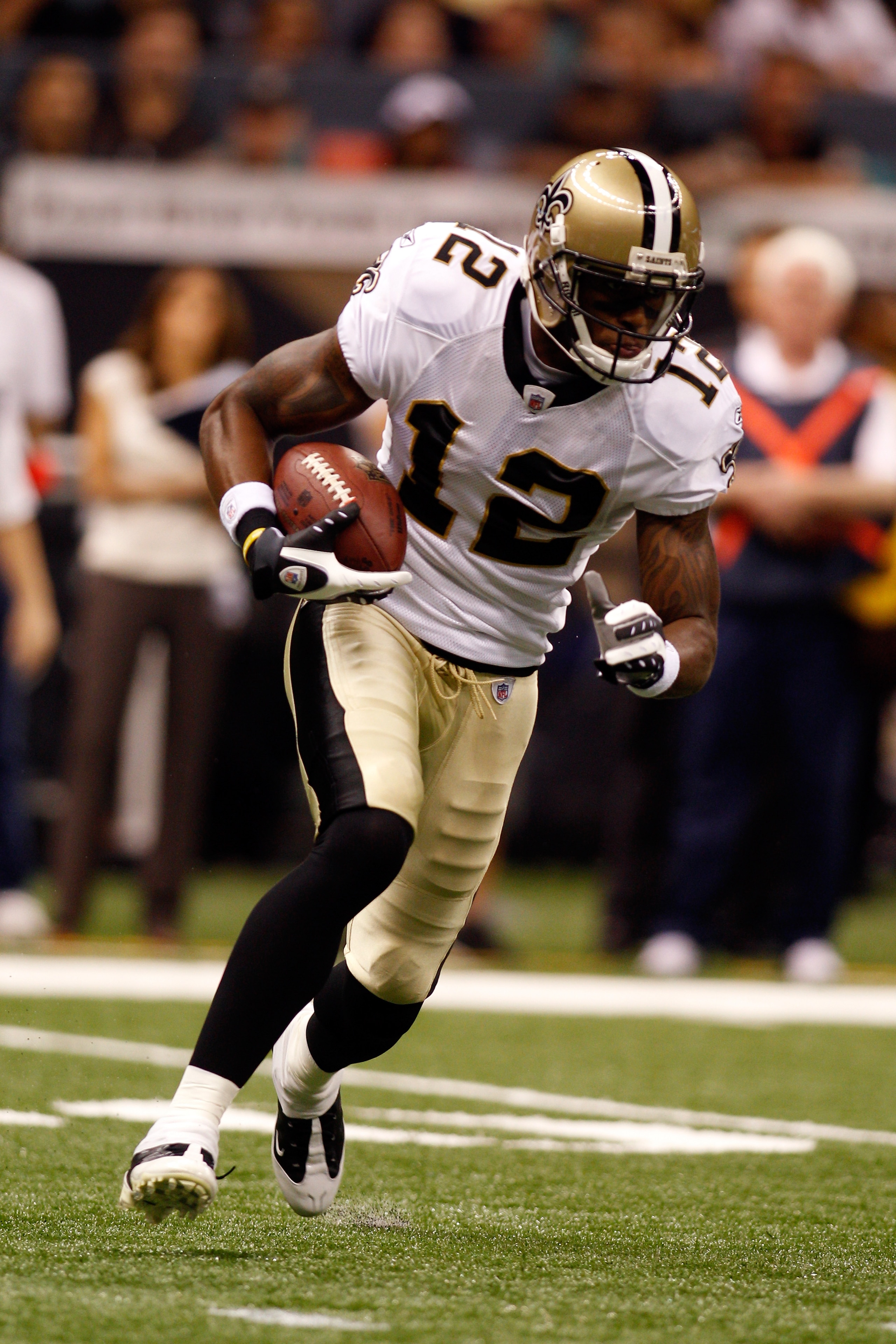 NEW ORLEANS - AUGUST 27:  Marques Colston #12 of the New Orleans Saints in action against the San Diego Chargers at the Louisiana Superdome on August 27, 2010 in New Orleans, Louisiana.  (Photo by Chris Graythen/Getty Images)