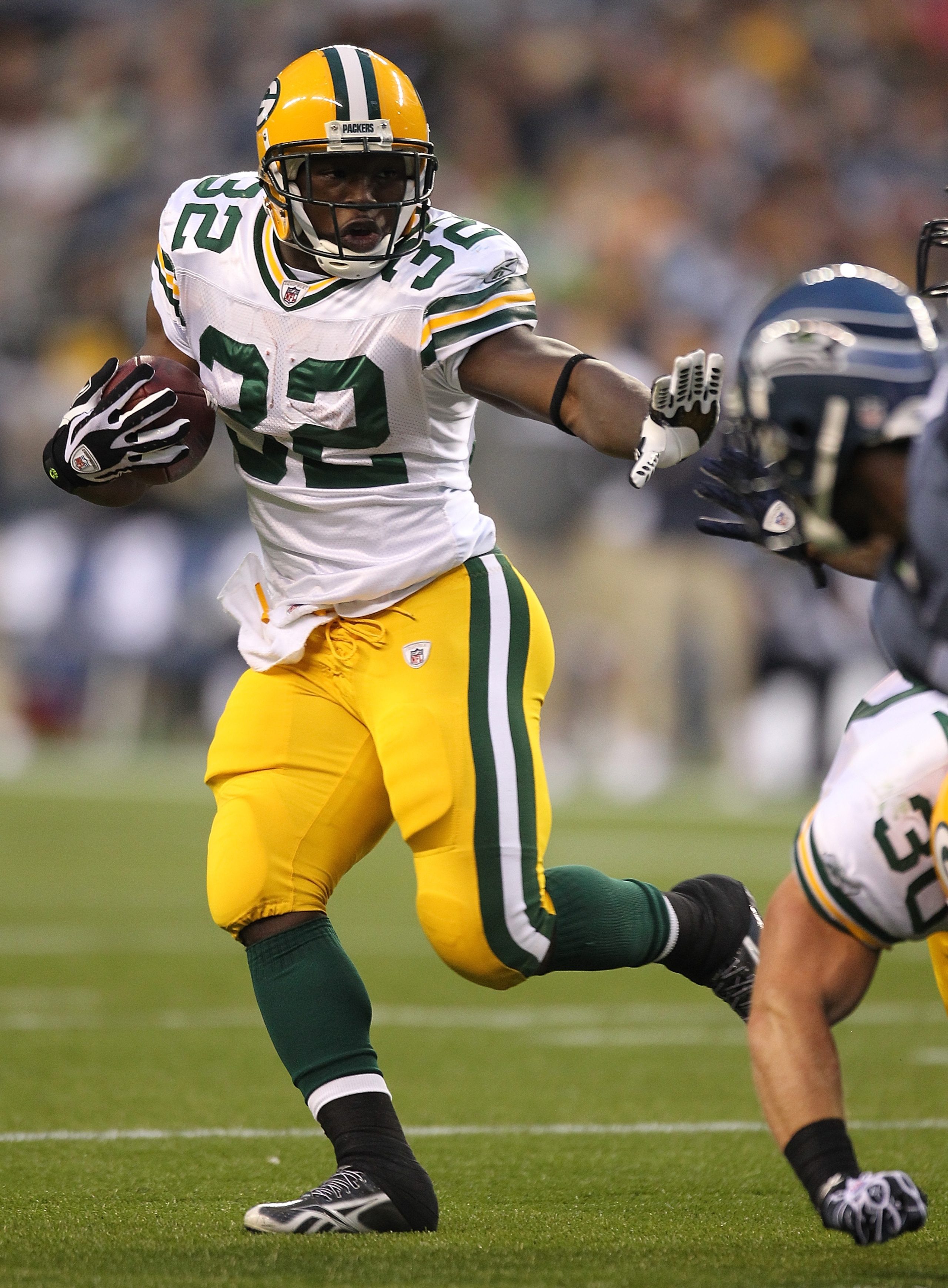 SEATTLE - AUGUST 21:  Running back Brandon Jackson #32 of the Green Bay Packers rushes during the preseason game against the Seattle Seahawks at Qwest Field on August 21, 2010 in Seattle, Washington. (Photo by Otto Greule Jr/Getty Images)