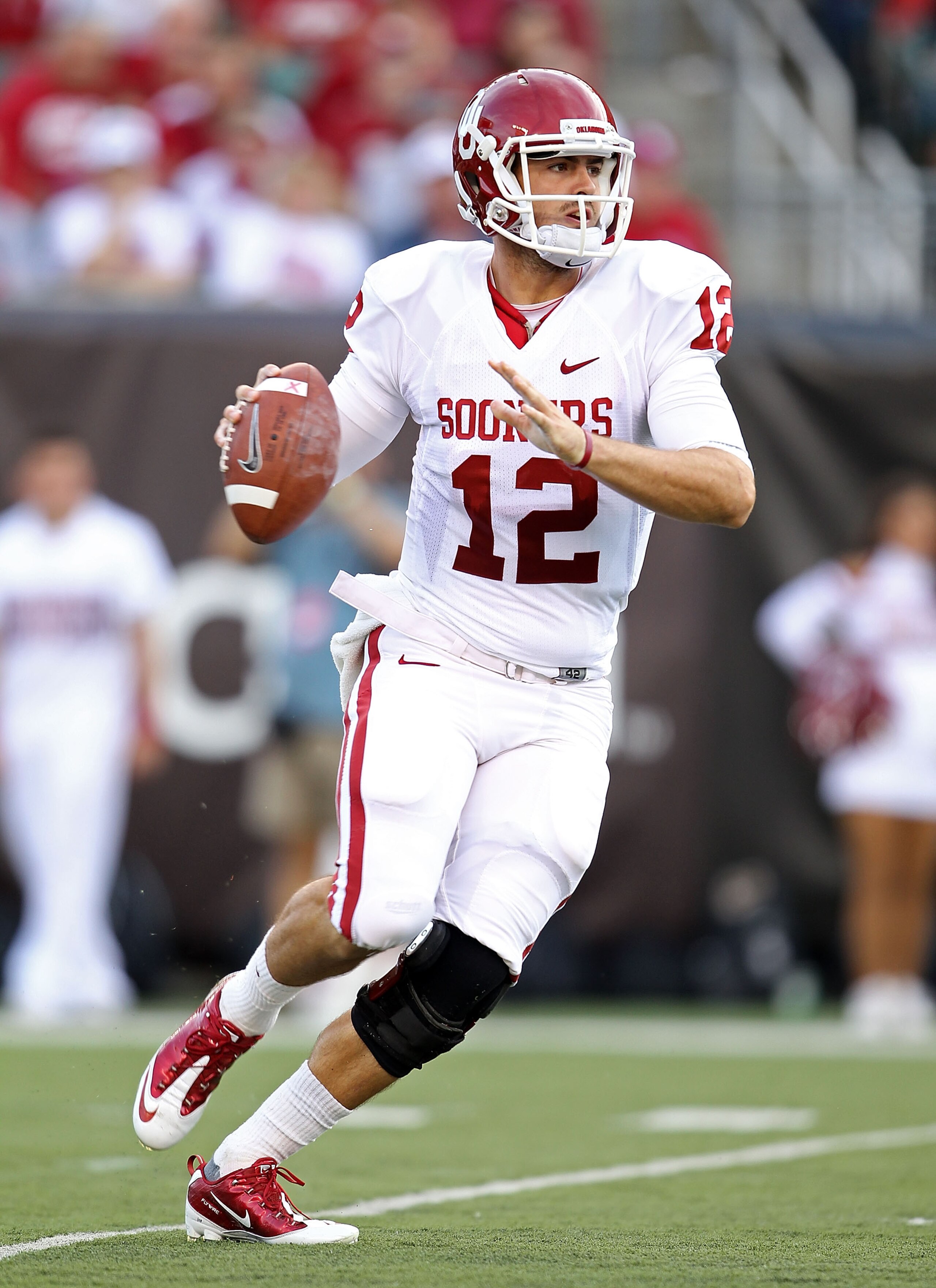 CINCINNATI - SEPTEMBER 25:  Landry Jones #12 of the Oklahoma Sooners throws a pass during the game against the Cincinnati Bearcats at Paul Brown Stadium on September 25, 2010 in Cincinnati, Ohio.  (Photo by Andy Lyons/Getty Images)
