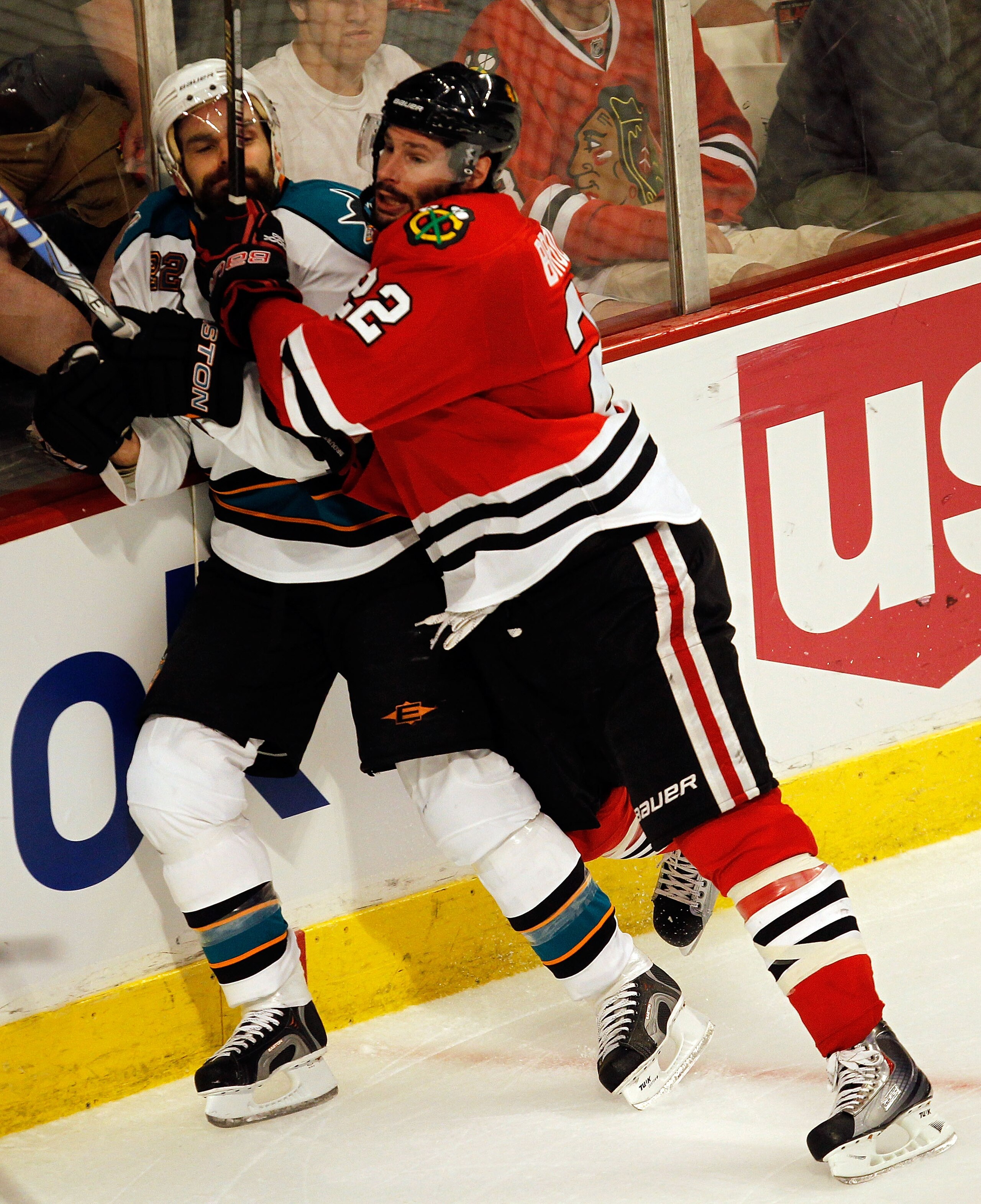 CHICAGO - MAY 23:  Troy Brouwer #22 of the Chicago Blackhawks checks Dan Boyle #22 of the San Jose Sharks in the second period of Game Four of the Western Conference Finals during the 2010 NHL Stanley Cup Playoffs at the United Center on May 23, 2010 in C