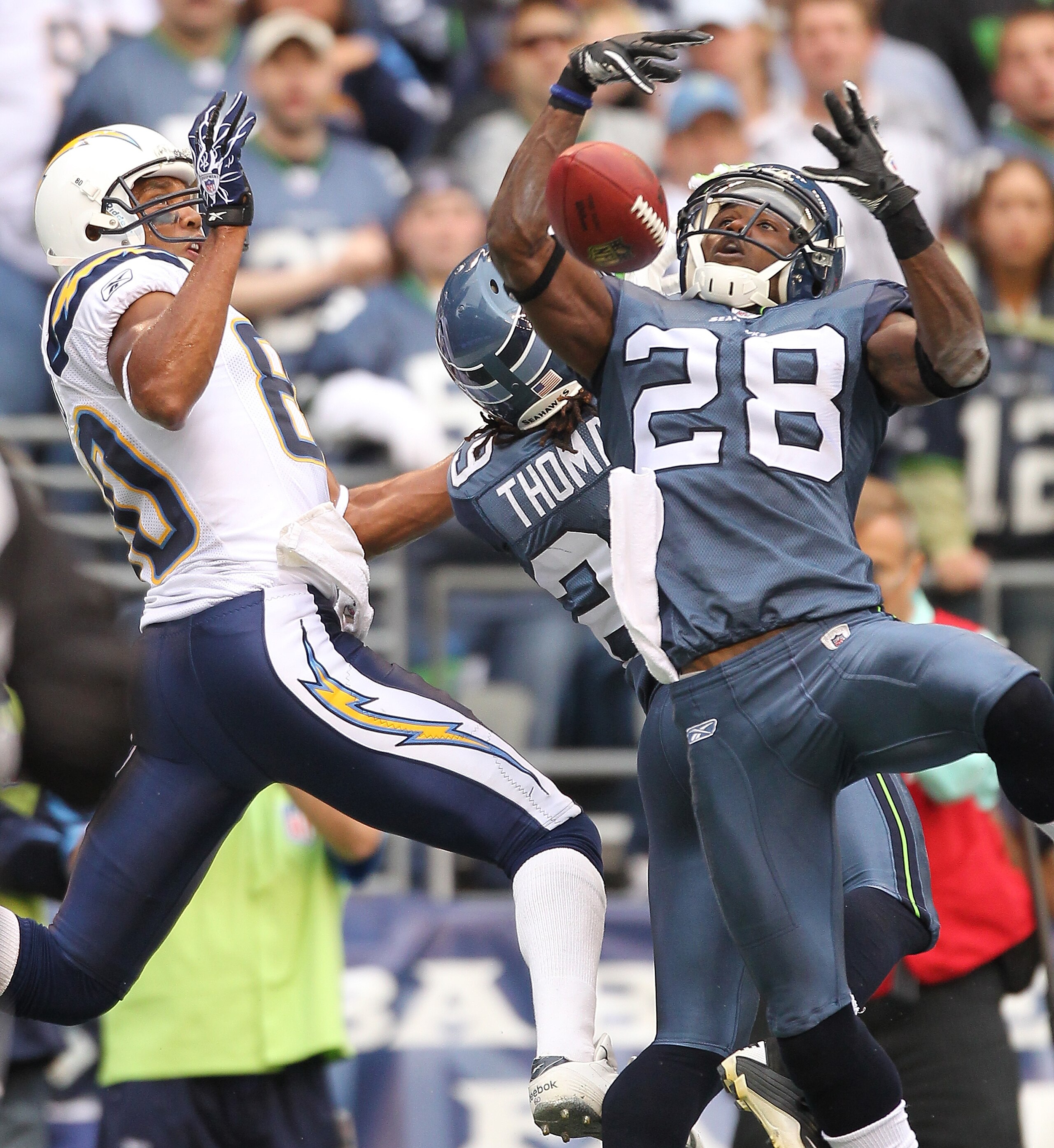 SEATTLE - SEPTEMBER 26: Cornerback Walter Thurmond #28 of the Seattle Seahawks breaks up a pass against Malcom Floyd #80 of the San Diego Chargers at Qwest Field on September 26, 2010 in Seattle, Washington. The Seahawks defeated the Chargers 27-20. (Pho SEATTLE - SEPTEMBER 26: Cornerback Walter Thurmond #28 of the Seattle Seahawks breaks up a pass against Malcom Floyd #80 of the San Diego Chargers at Qwest Field on September 26, 2010 in Seattle, Washington. The Seahawks defeated the Chargers 27-20. (Pho