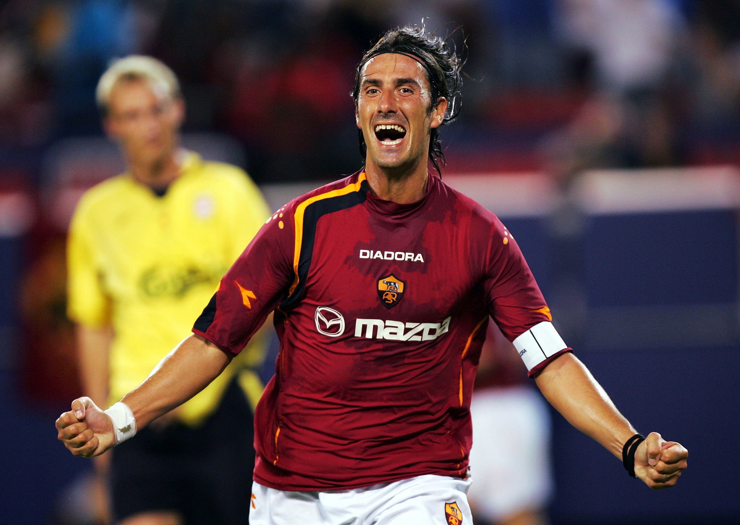 EAST RUTHERFORD, NJ - AUGUST 3: Marco Del Vecchio #9 of AS Roma celebrates after scoring a goal against Liverpoolduring the ChampionsWorld Series at Giant Stadium August 3, 2004 in East Rutherford, New Jersey. (Photo by Ezra Shaw/Getty Images) EAST RUTHERFORD, NJ - AUGUST 3: Marco Del Vecchio #9 of AS Roma celebrates after scoring a goal against Liverpoolduring the ChampionsWorld Series at Giant Stadium August 3, 2004 in East Rutherford, New Jersey. (Photo by Ezra Shaw/Getty Images)