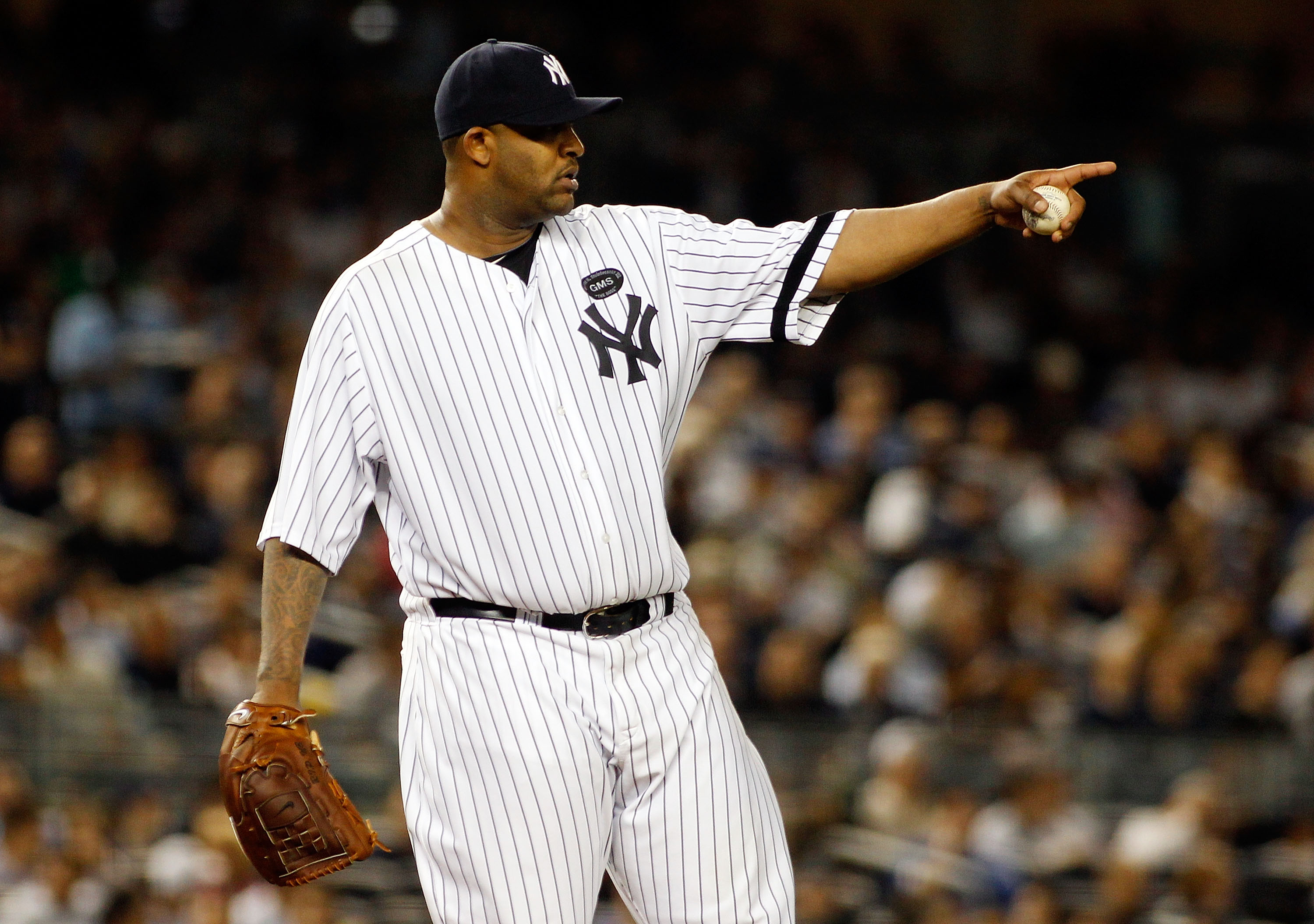 NEW YORK - SEPTEMBER 23:  CC Sabathia #52 of the New York Yankees looks on against the Tampa Bay Rays on September 23, 2010 at Yankee Stadium in the Bronx borough of New York City.  (Photo by Mike Stobe/Getty Images)