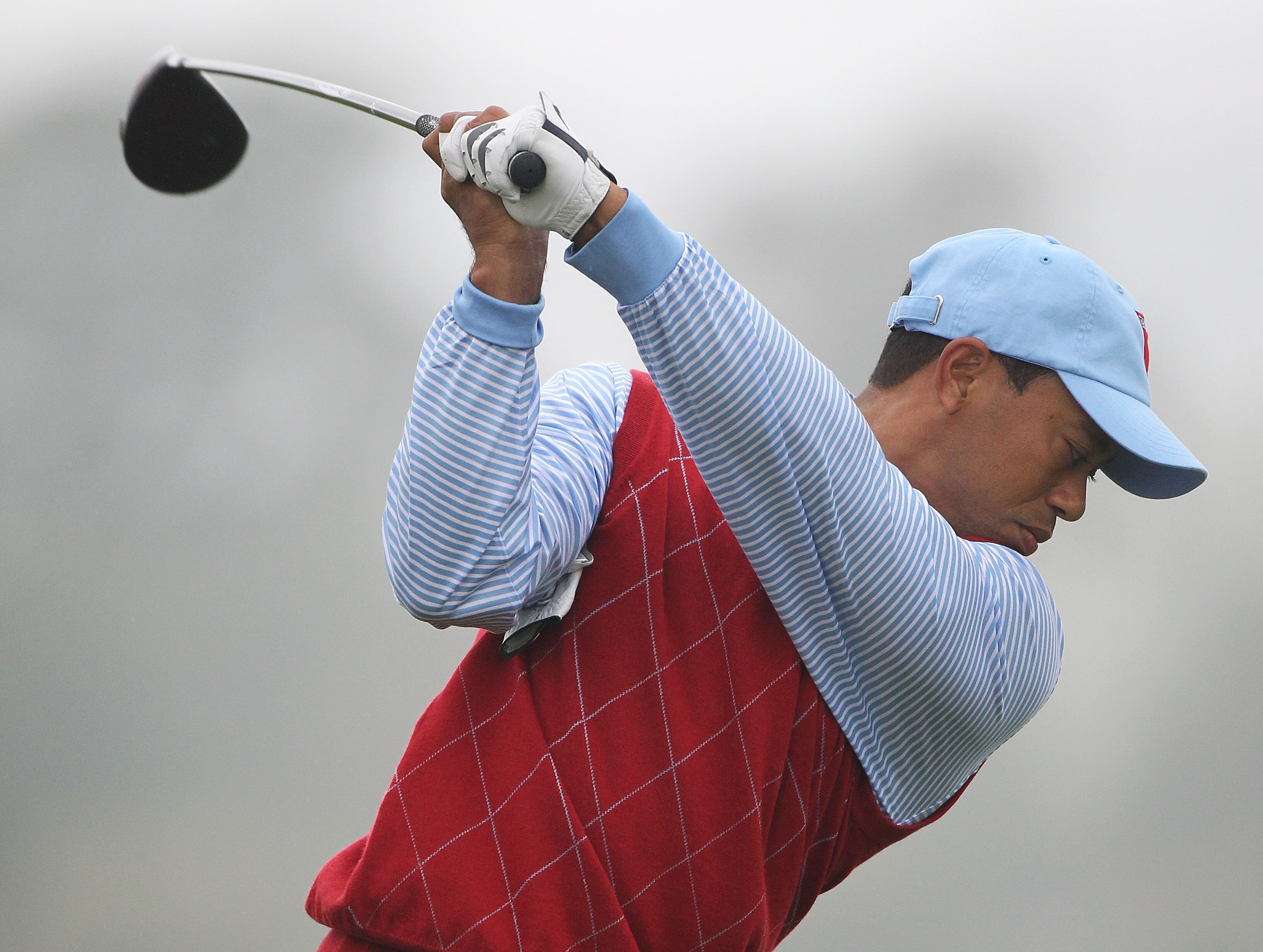 NEWPORT, WALES - SEPTEMBER 28:  Tiger Woods of the USA tees off during a practice round prior to the 2010 Ryder Cup at the Celtic Manor Resort on September 28, 2010 in Newport, Wales.  (Photo by Andy Lyons/Getty Images)
