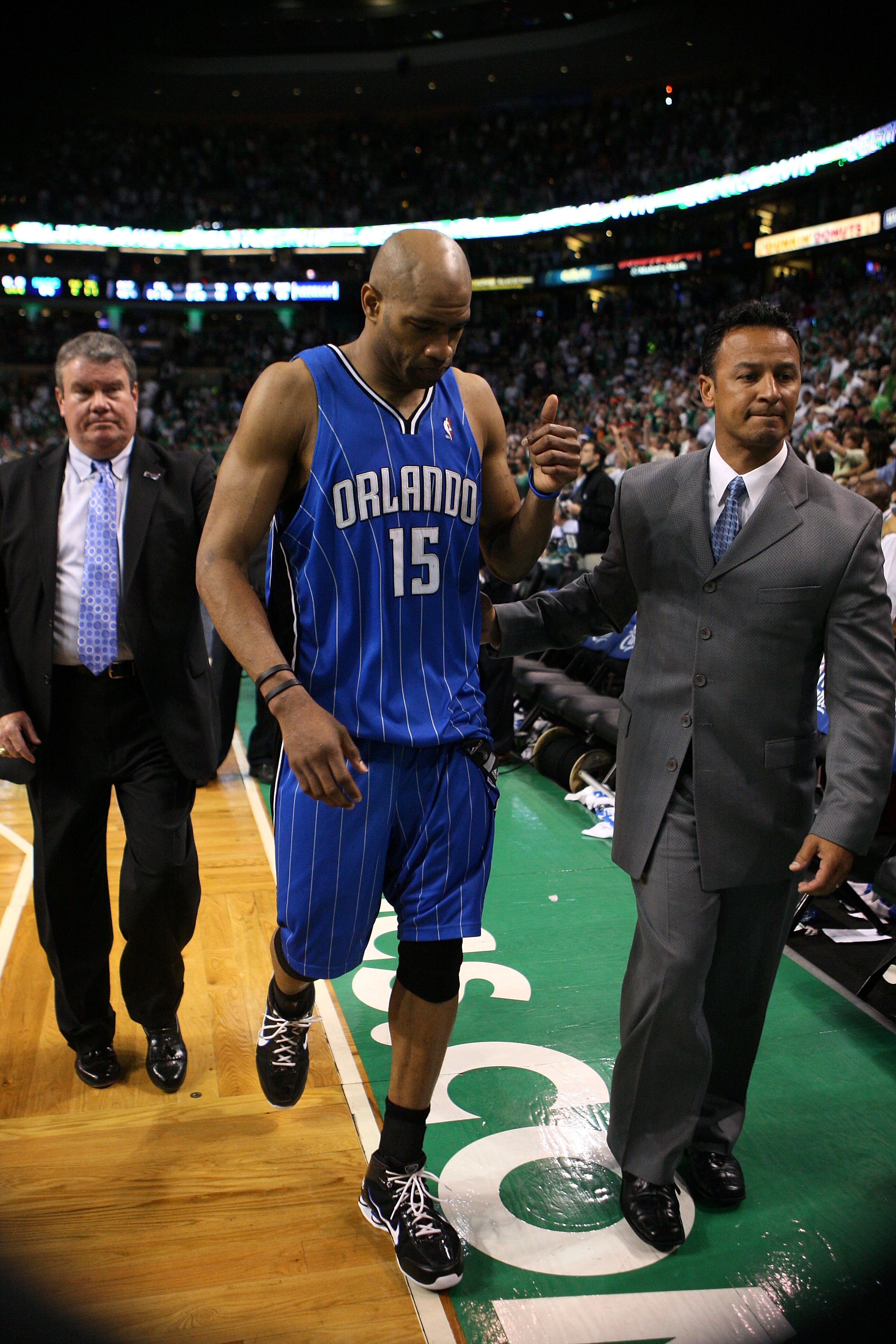 BOSTON - MAY 28:  Vince Carter #15 of the Orlando Magic walks off the court dejected after the Magic lost 96-84 against the Boston Celtics in Game Six of the Eastern Conference Finals during the 2010 NBA Playoffs at TD Garden on May 28, 2010 in Boston, Ma