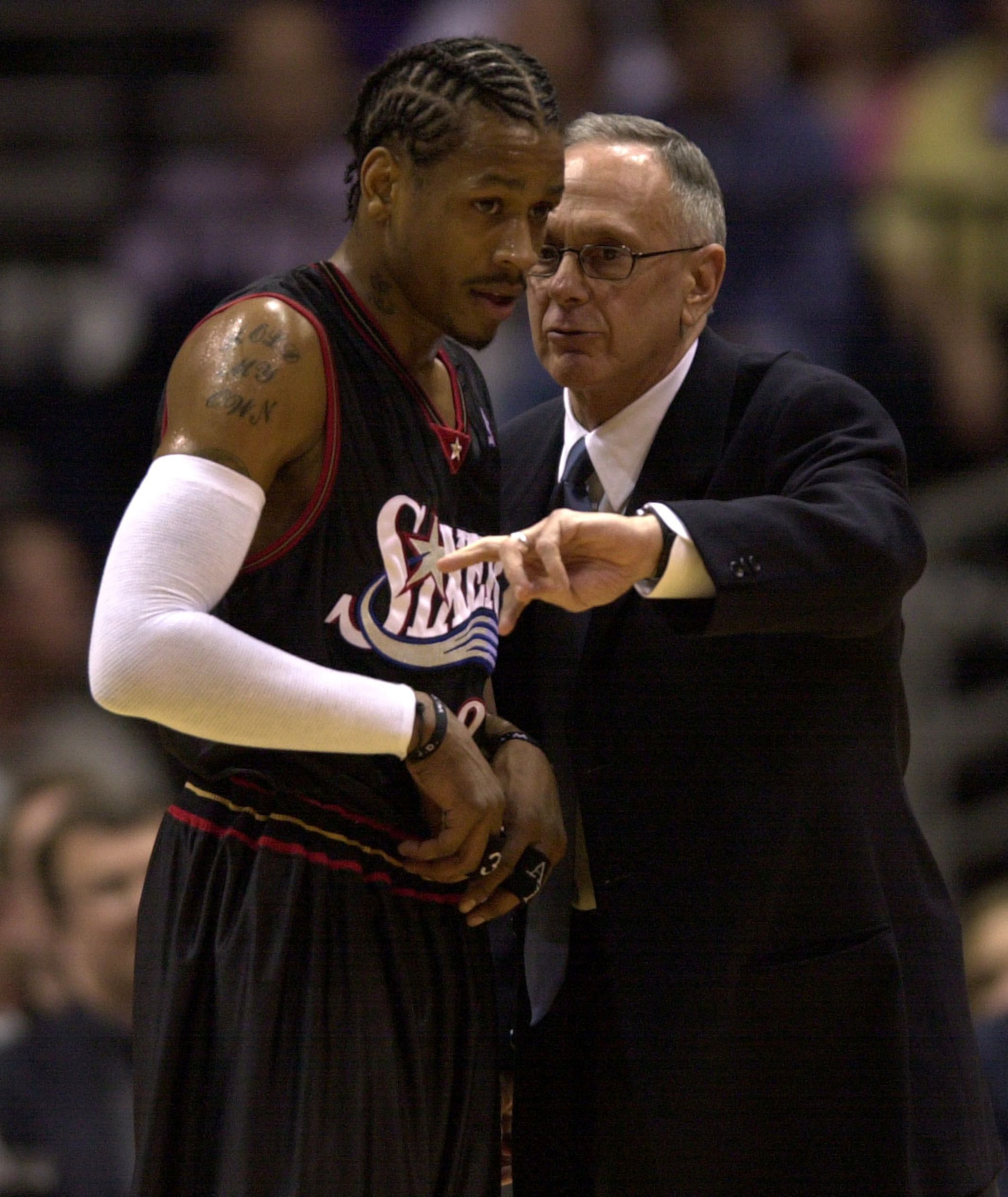 28 May 2001:  Allen Iverson #3 of the Philadelphia 76ers, left, receives instruction from Sixers head coach Larry Brown during game four of the NBA Eastern Conference Finals against the Milwaukee Bucks at the Bradley Center in Milwaukee, Wisconsin. The 76