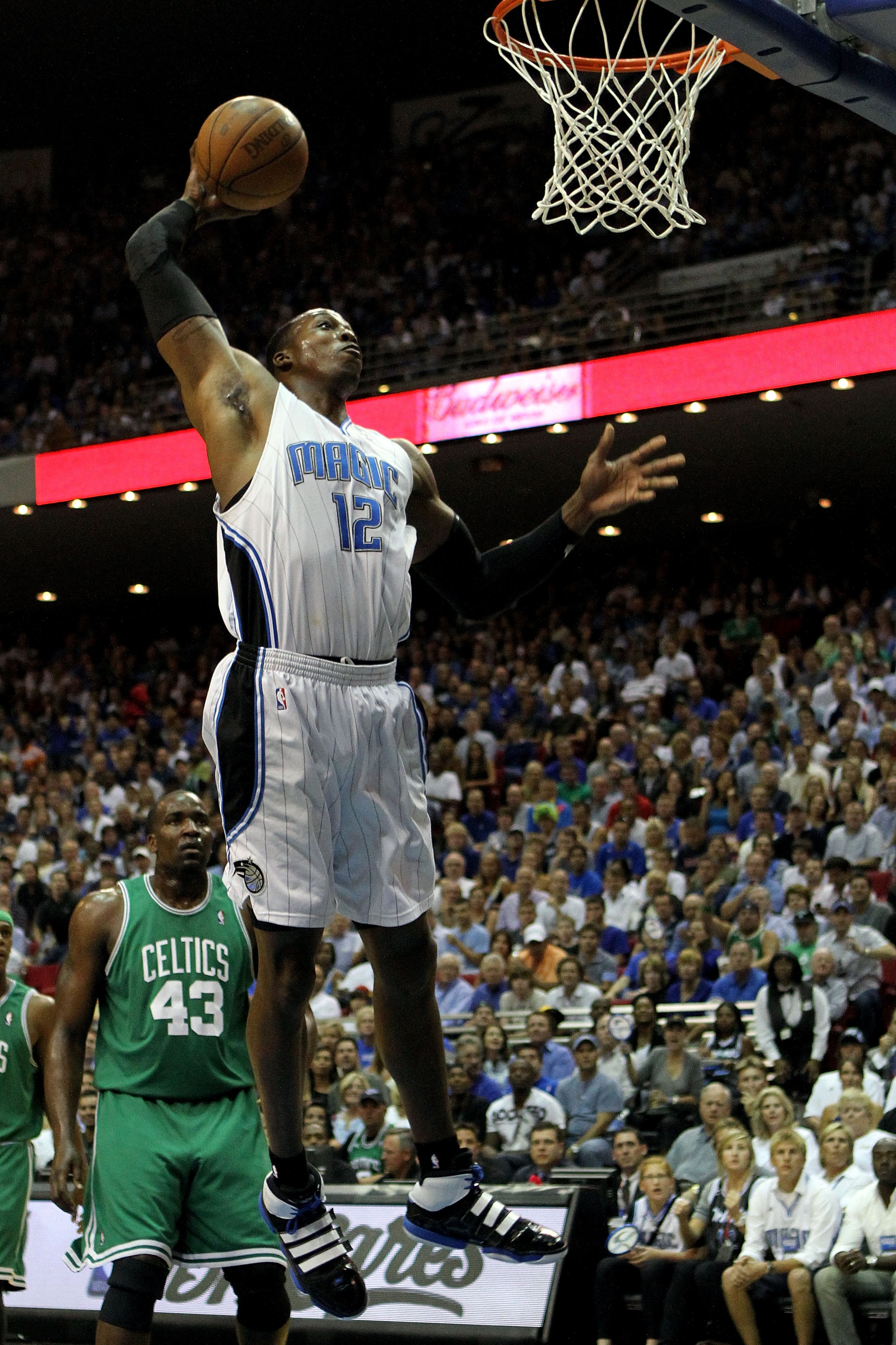 ORLANDO, FL - MAY 26: Dwight Howard #12 of the Orlando Magic dunks against the Boston Celtics in Game Five of the Eastern Conference Finals during the 2010 NBA Playoffs at Amway Arena on May 26, 2010 in Orlando, Florida. NOTE TO USER: User expressly ack ORLANDO, FL - MAY 26: Dwight Howard #12 of the Orlando Magic dunks against the Boston Celtics in Game Five of the Eastern Conference Finals during the 2010 NBA Playoffs at Amway Arena on May 26, 2010 in Orlando, Florida. NOTE TO USER: User expressly ack