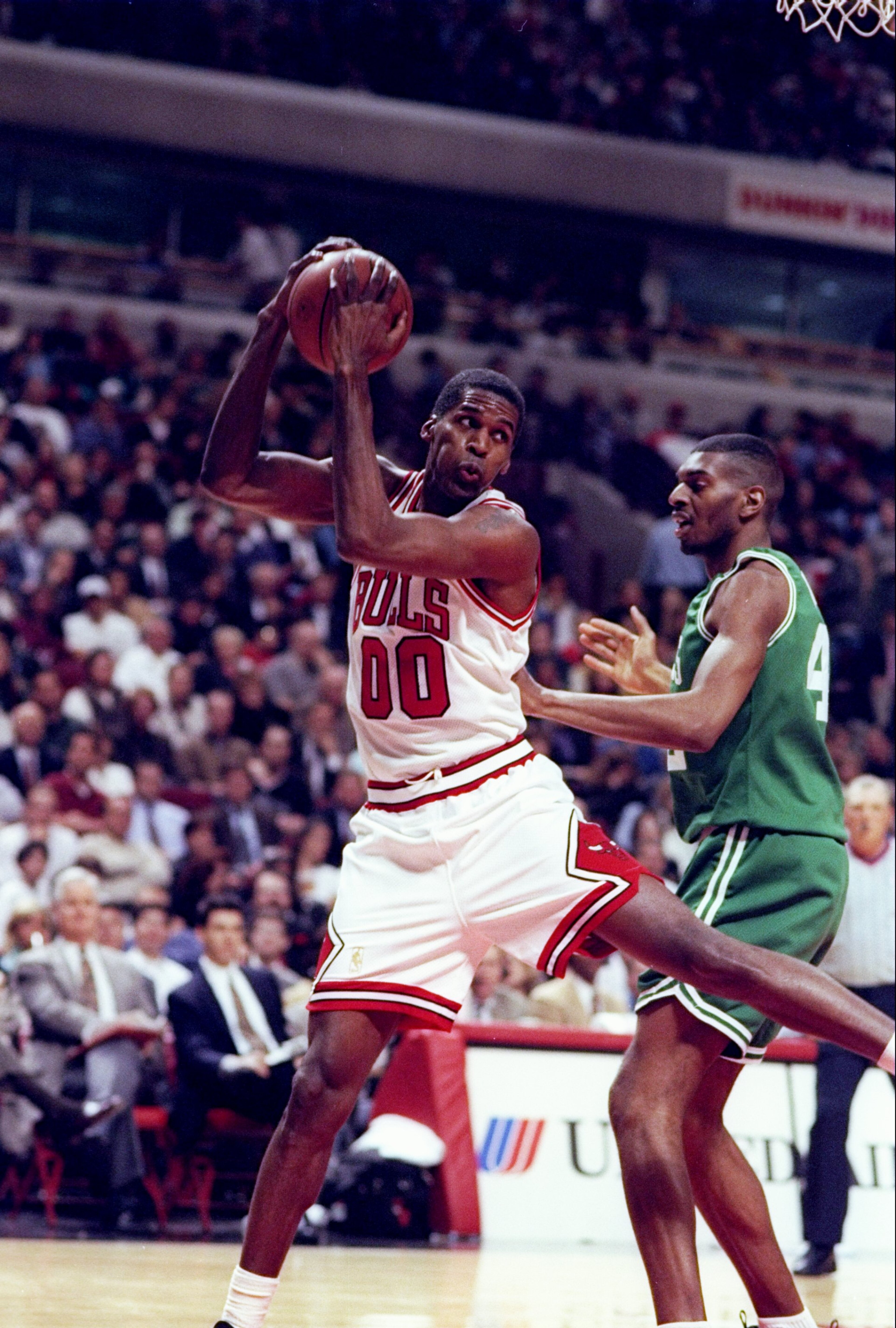 1 Apr 1997:  Center Robert Parish of the Chicago Bulls (left)  in action against center Steve Hamer of the Boston Celtics during a game at the United Center in Chicago, Illinois.  The Bulls won the game 111-106. Mandatory Credit: Jonathan Daniel  /Allspor