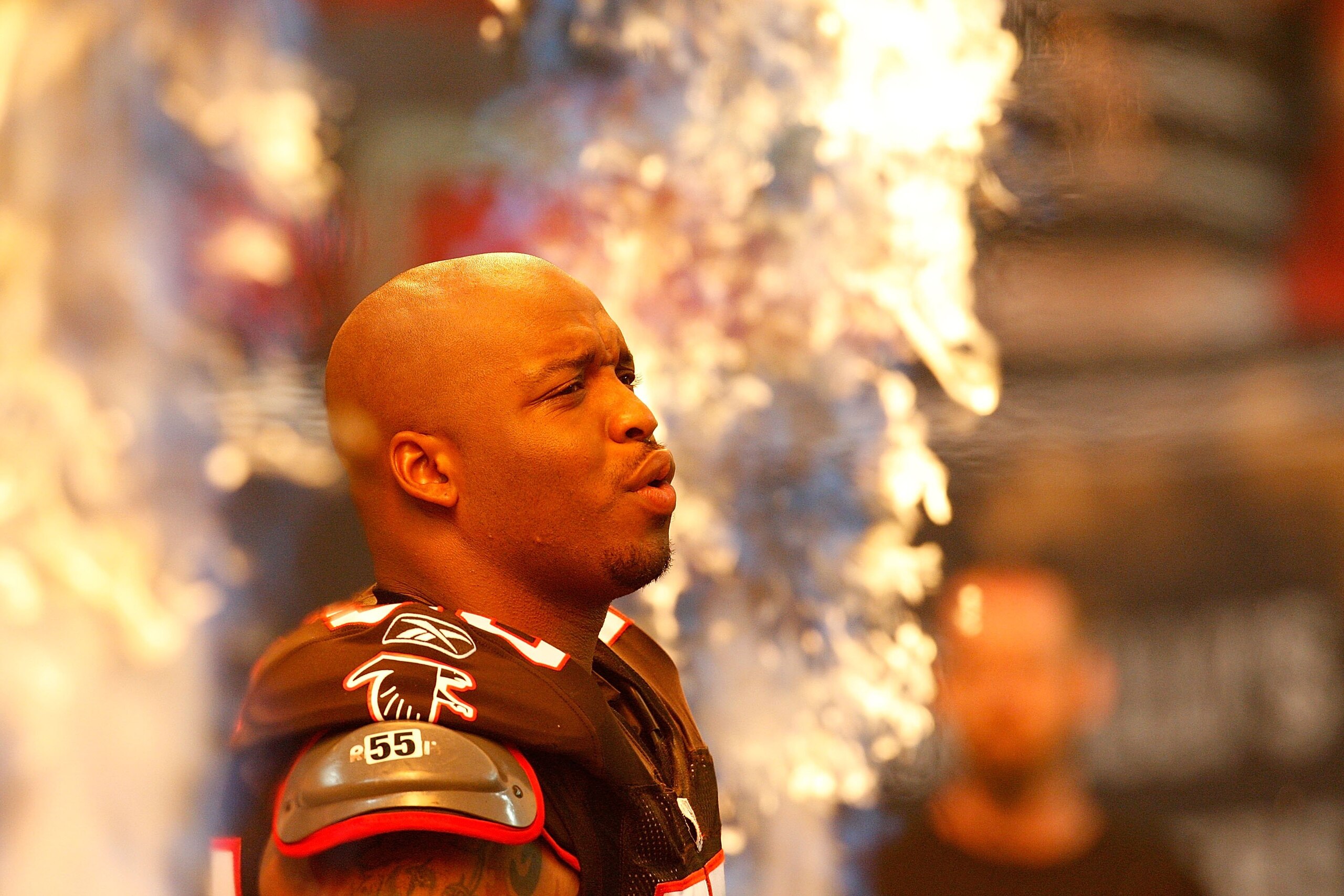 ATLANTA - SEPTEMBER 20:  John Abraham #55 of the Atlanta Falcons enters the field to face the Carolina Panthers at Georgia Dome on September 20, 2009 in Atlanta, Georgia.  (Photo by Kevin C. Cox/Getty Images)