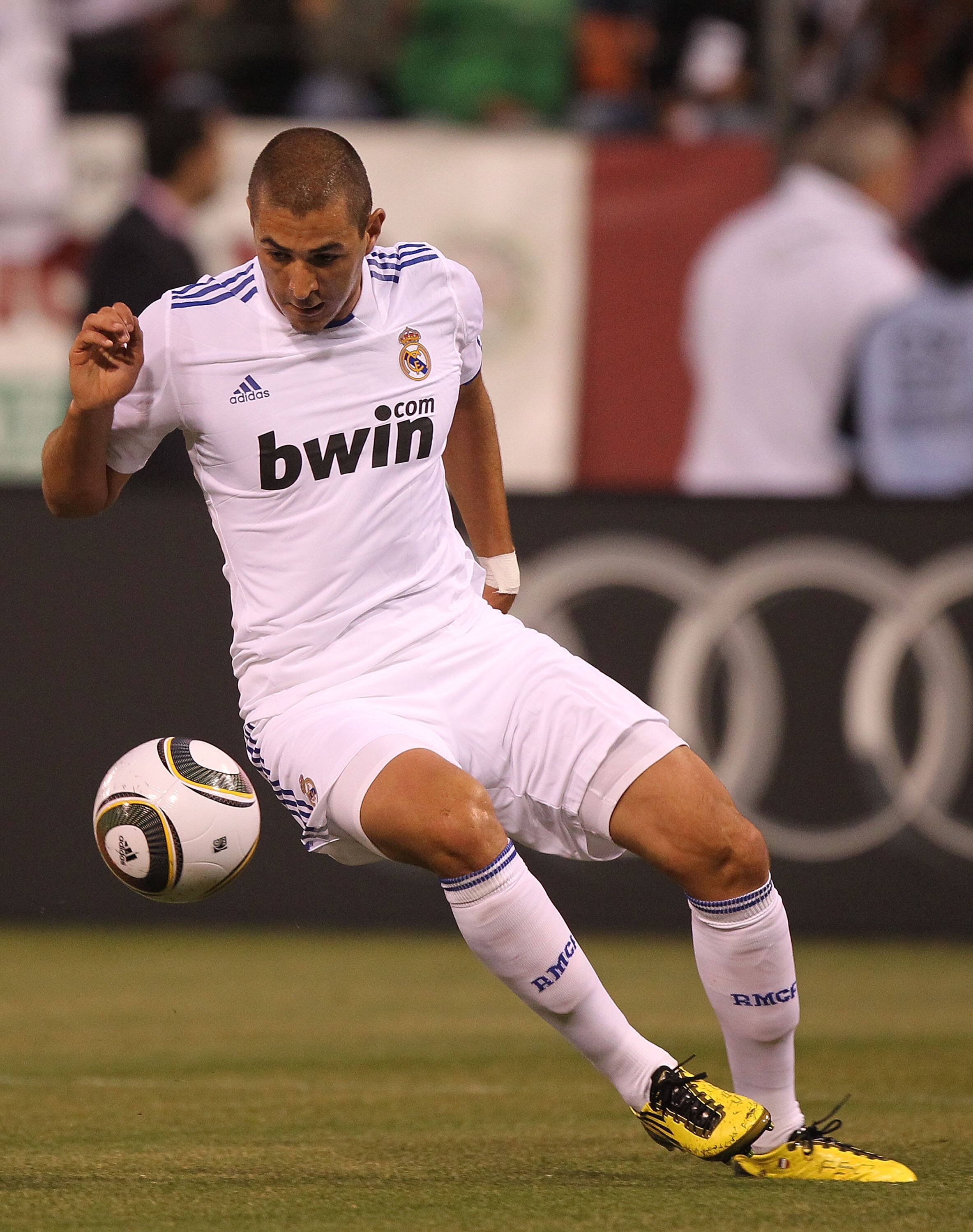 SAN FRANCISCO - AUGUST 04:  Karim Benzema #11 of Real Madrid dribbles the ball against Club America of Mexico during a pre-season game at Candlestick Park on August 4, 2010 in San Francisco, California.  (Photo by Jed Jacobsohn/Getty Images)