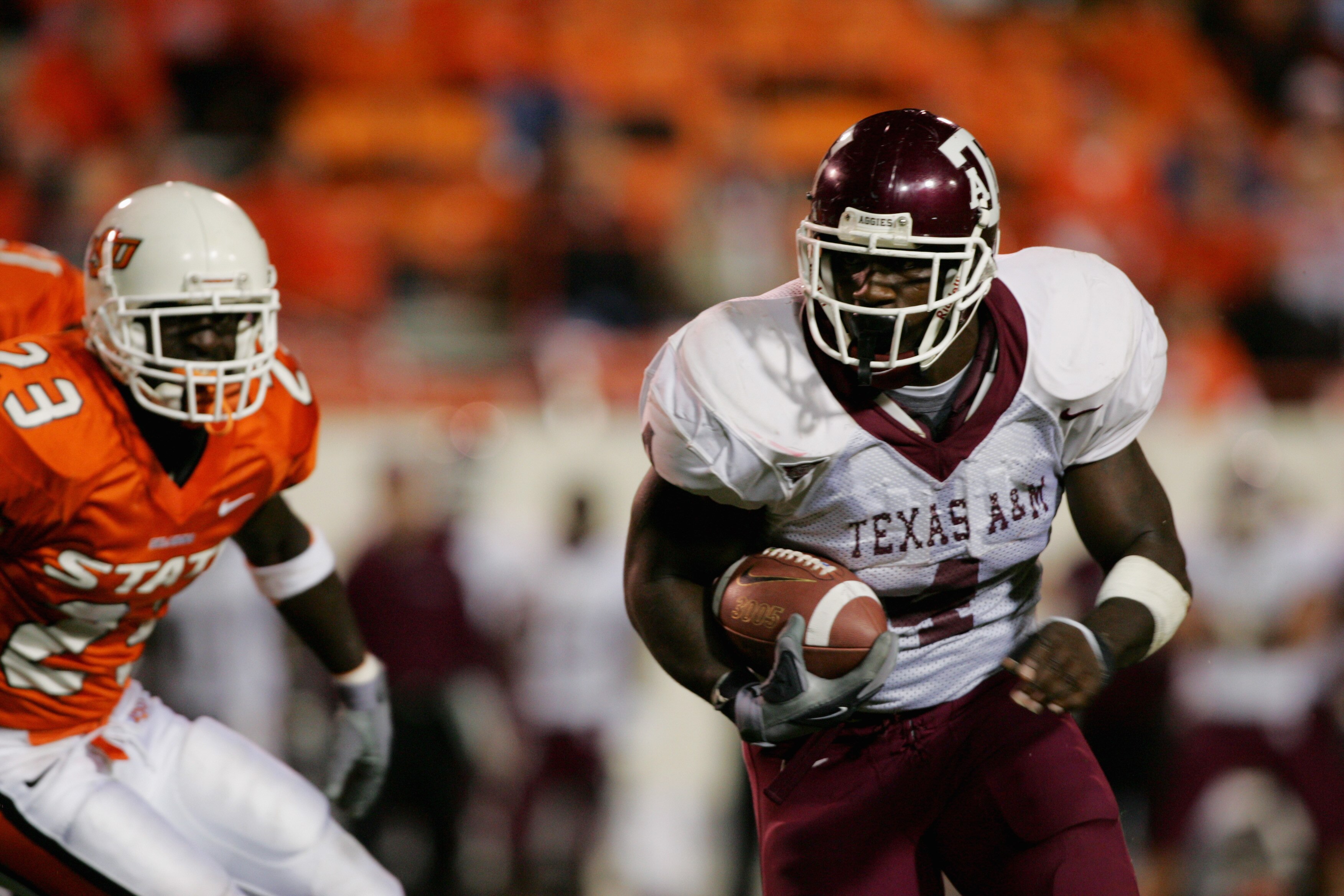 STILLWATER, OKLAHOMA - OCTOBER 16:  Running back Keith Joseph #4 of the Texas A&M Aggies carries the ball during the game against Oklahoma State Cowboys at Boone Pickens Stadium on October 16, 2004 in Stillwater, Oklahoma. Texas A&M beat Oklahoma State 36