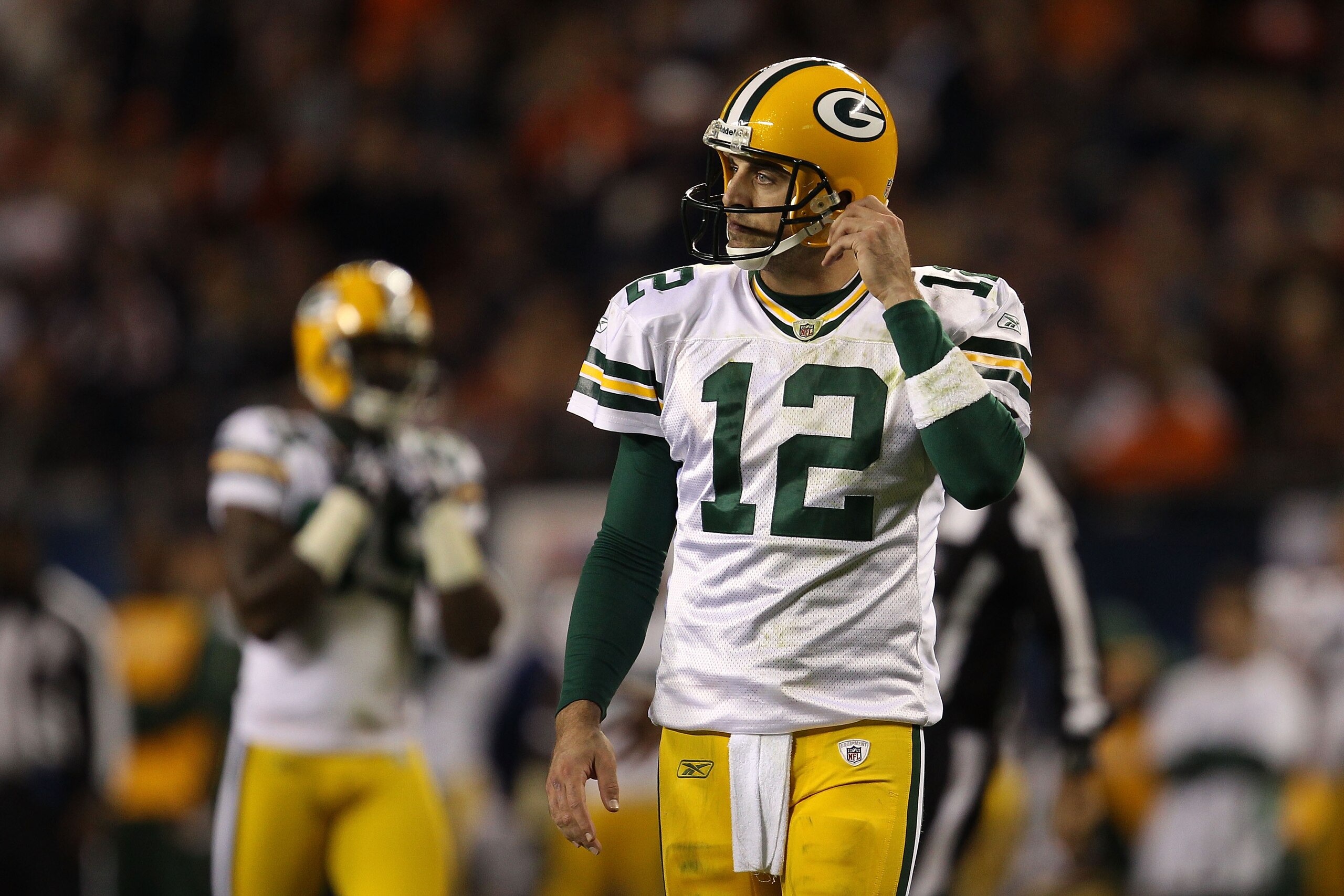 CHICAGO - SEPTEMBER 27:  Aaron Rodgers #12 of  the Green Bay Packers looks on dejected against the Chicago Bears at Soldier Field on September 27, 2010 in Chicago, Illinois.  (Photo by Jonathan Daniel/Getty Images)
