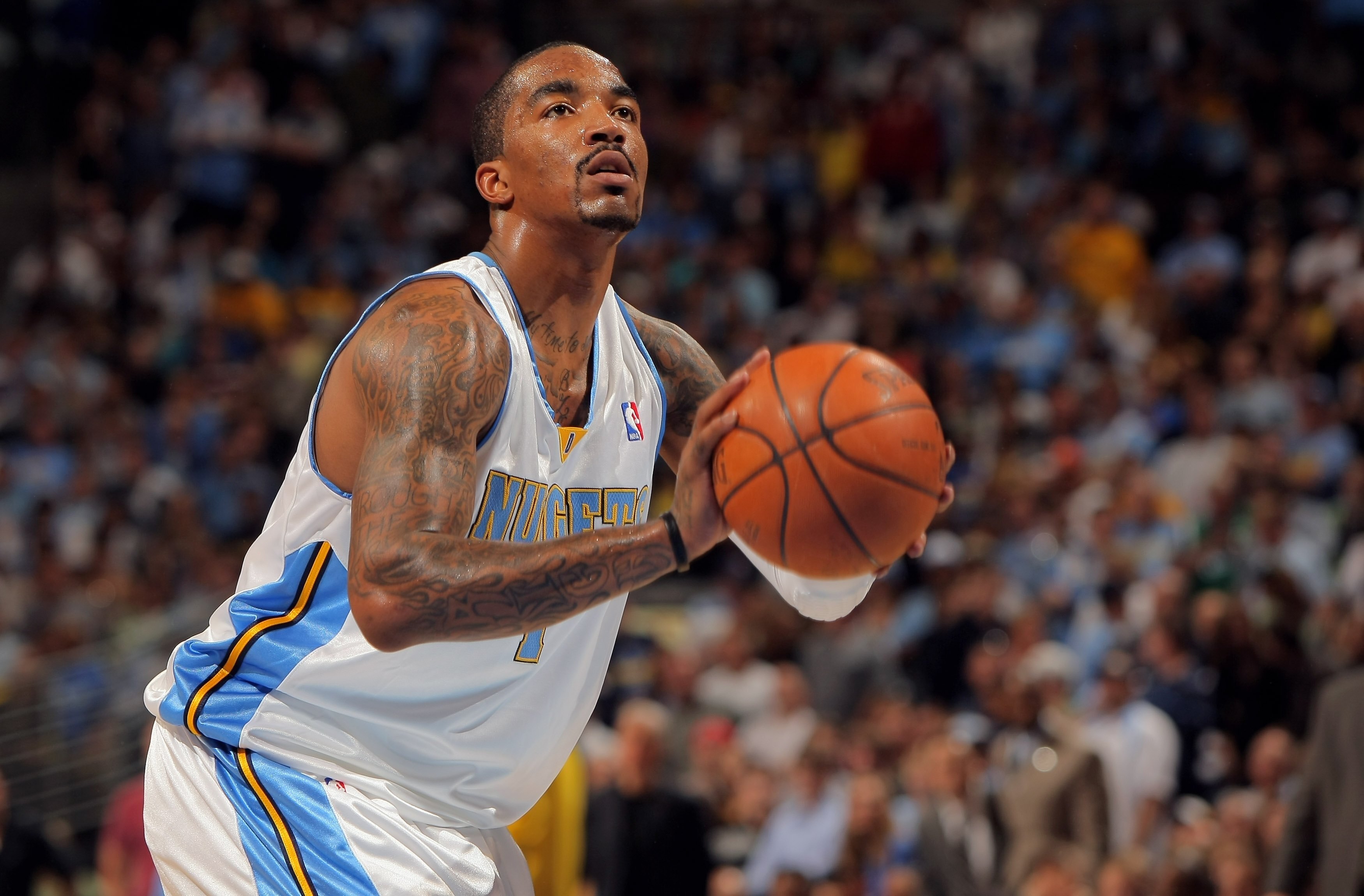 DENVER - MAY 03:  J.R. Smith #1 of the Denver Nuggets takes a free throw against the Dallas Mavericks in Game One of the Western Conference Semifinals during the 2009 NBA Playoffs at Pepsi Center on May 3, 2009 in Denver, Colorado. The Nuggets defeated th